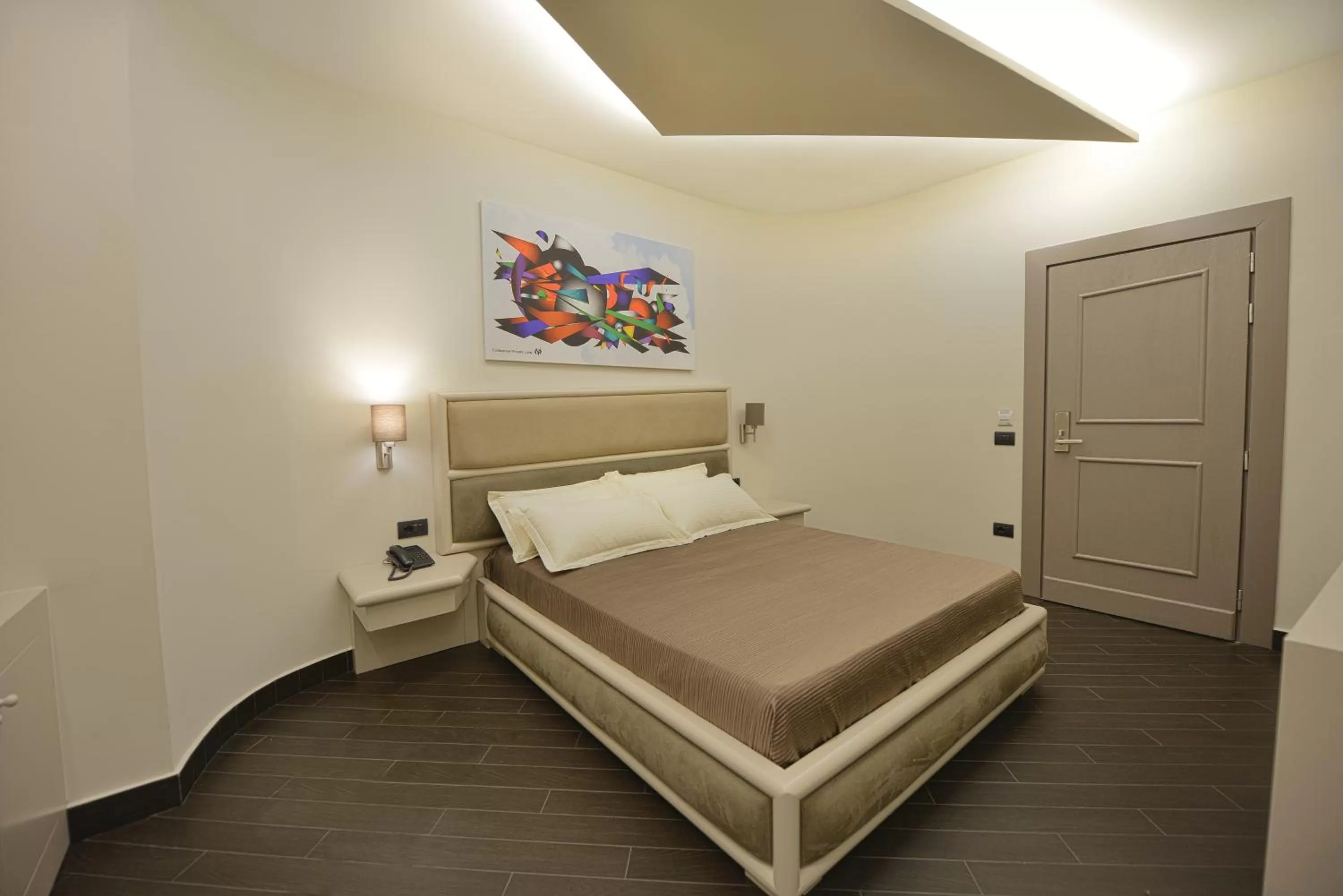 Bed in Petit Hotel Elita