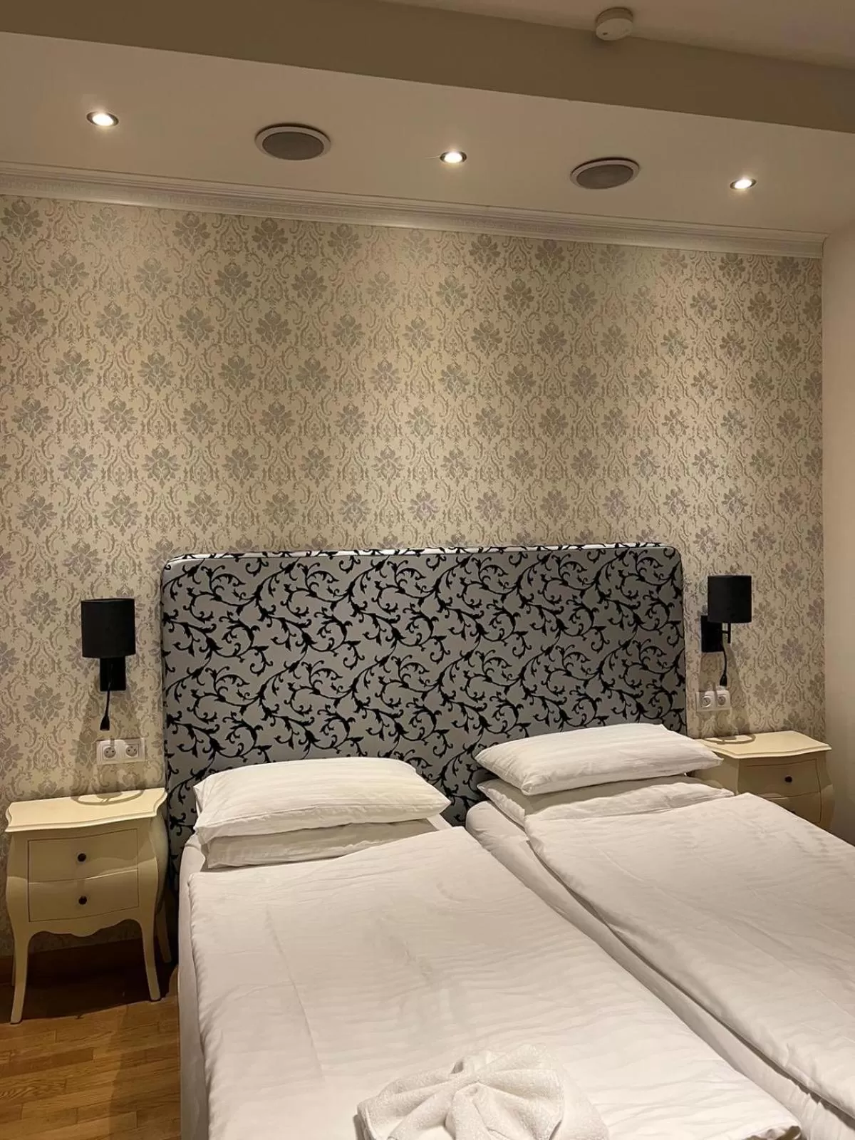 Bed in Dolce Vita Suites Boutique