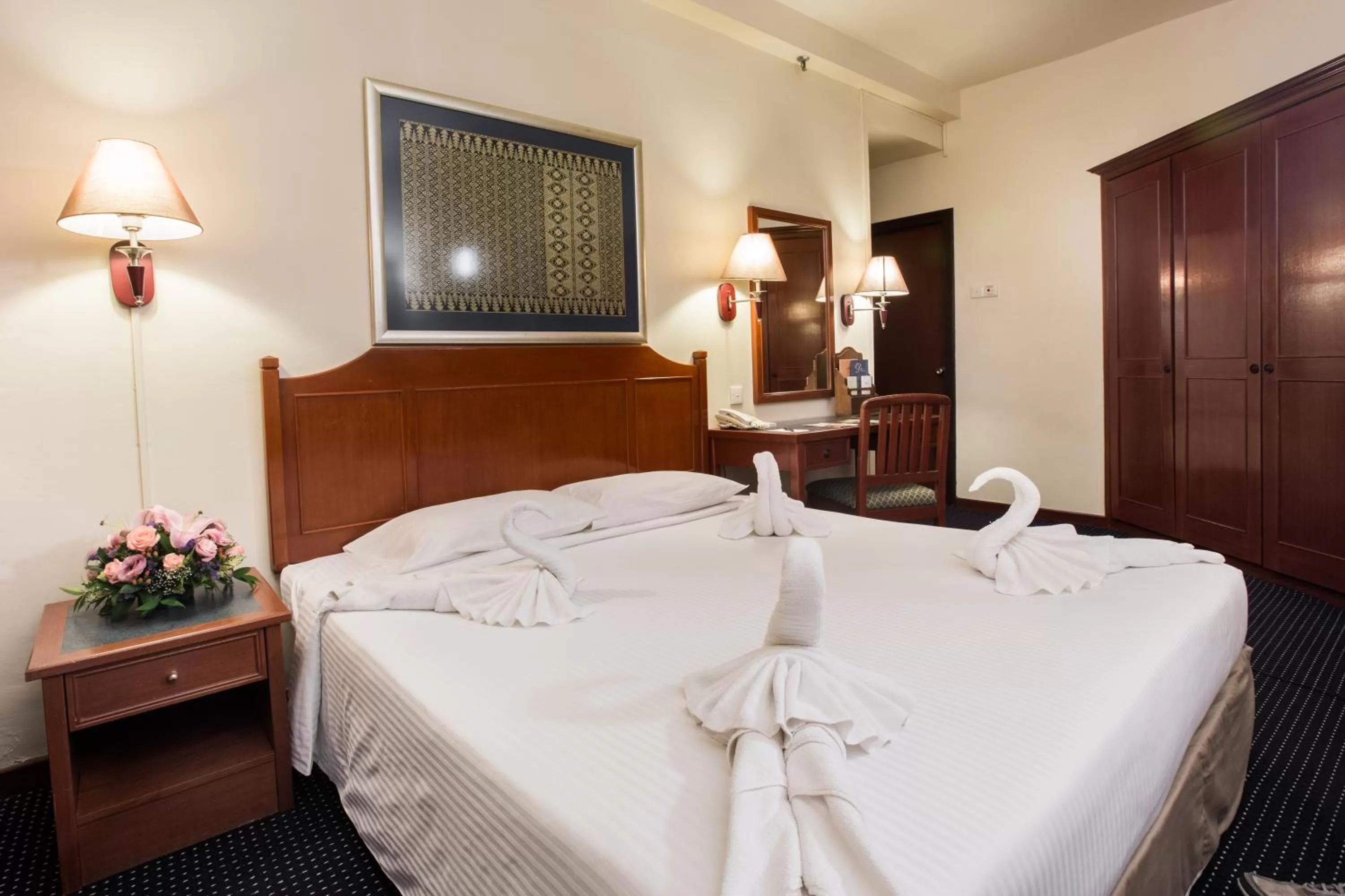 Bed in Rainbow Paradise Beach Resort