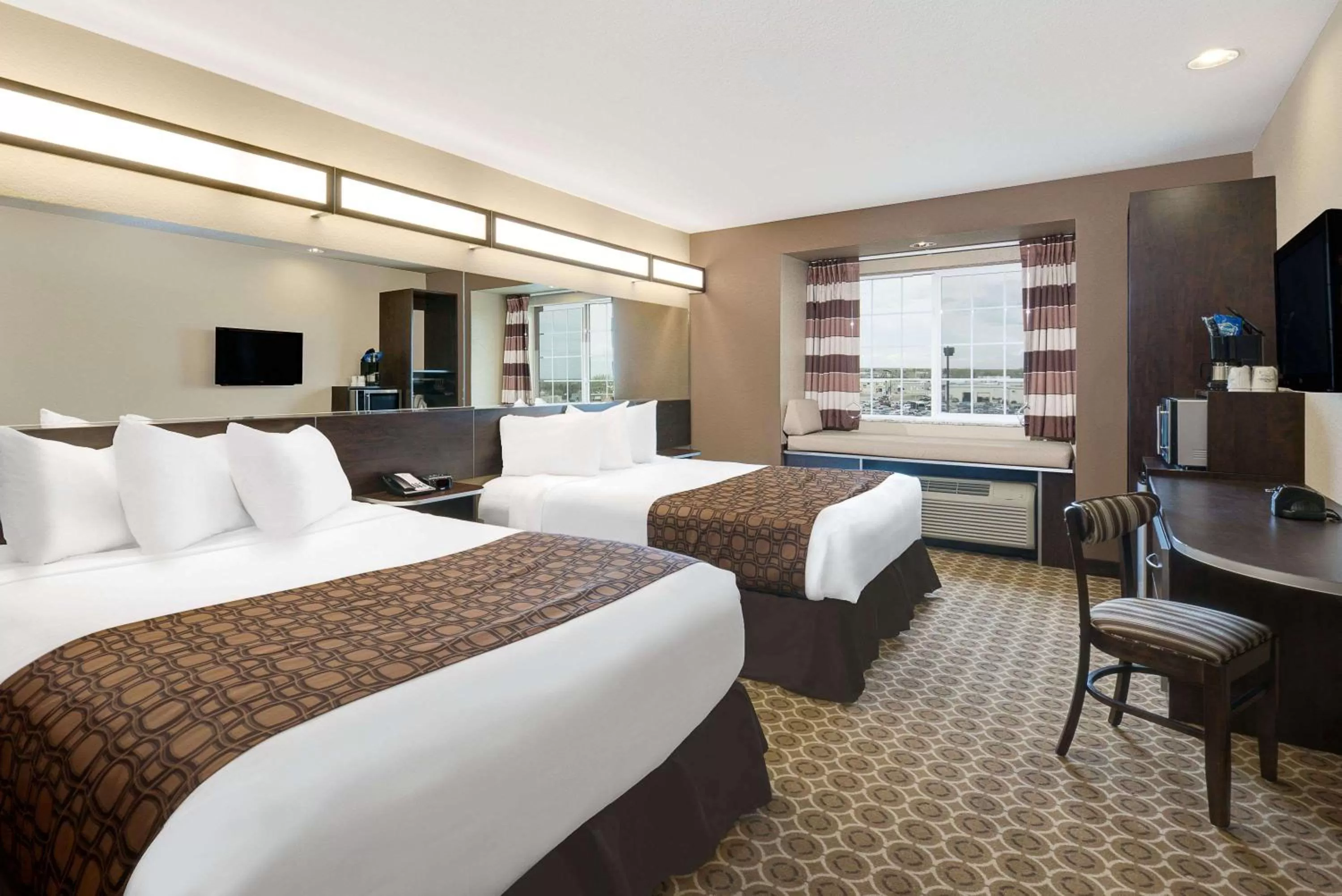 Photo of the whole room, Bed in Microtel Inn & Suites by Wyndham Williston