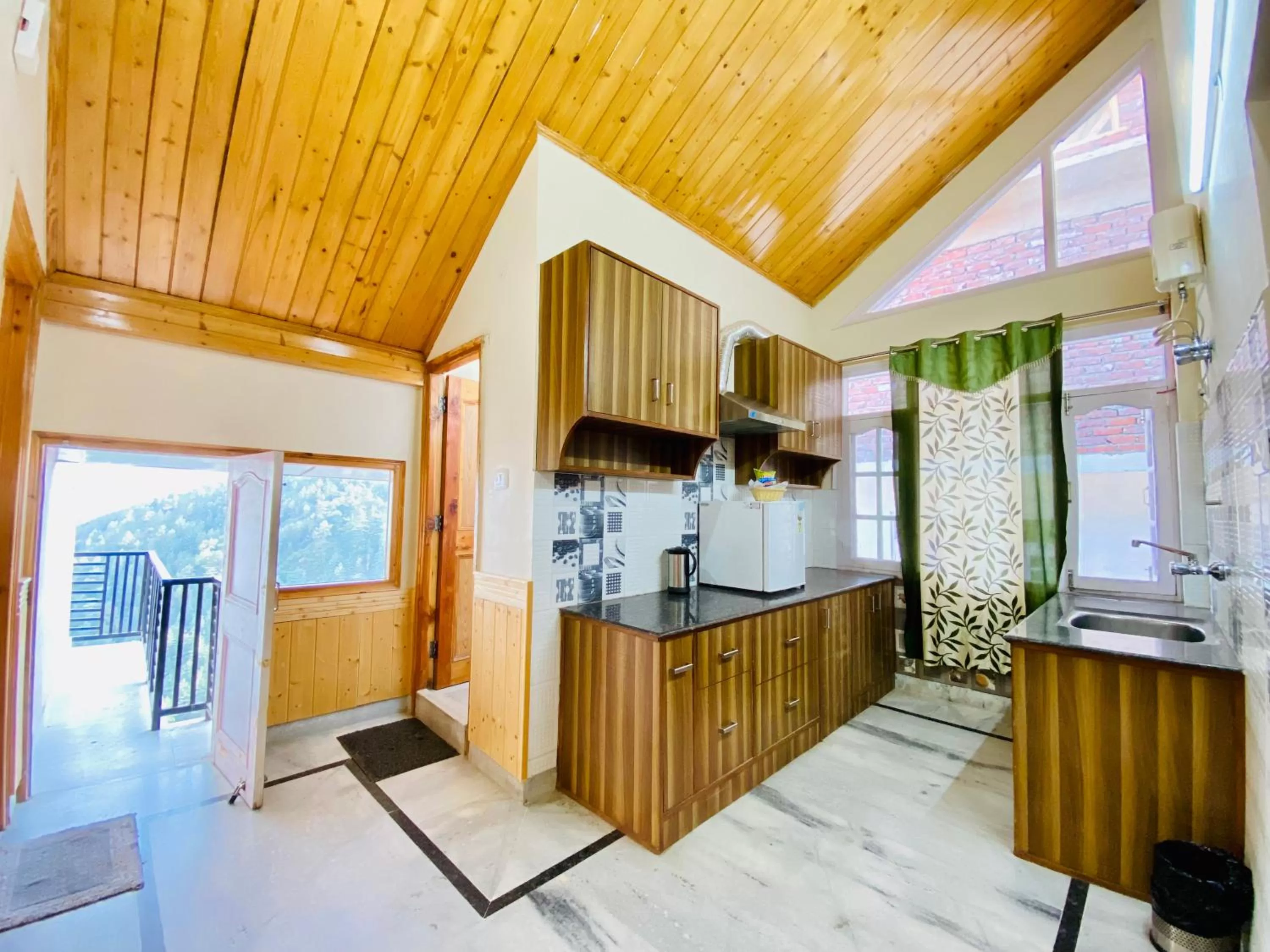 Kitchen or kitchenette in Sai Cottage Shimla