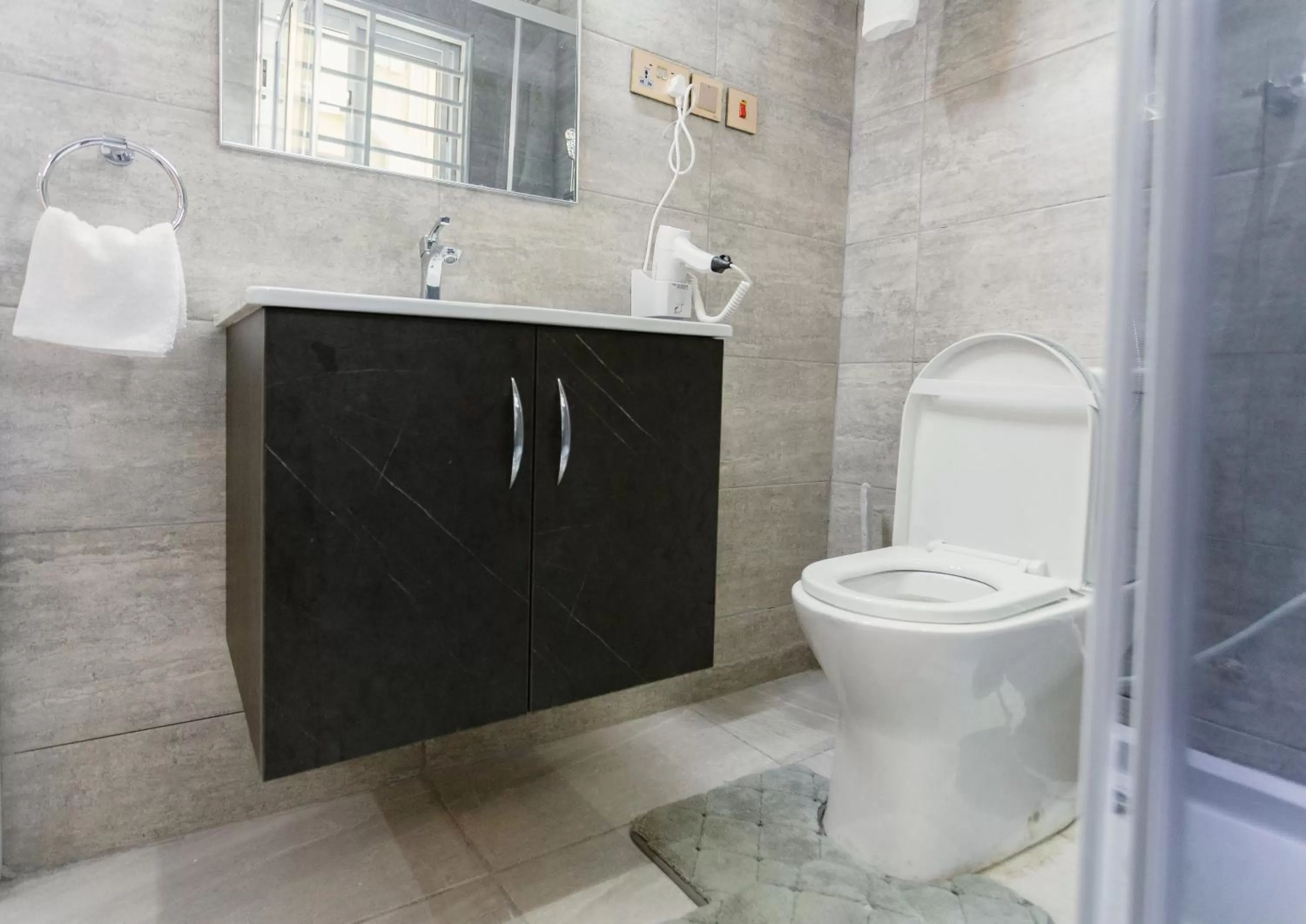 Toilet in The Avery Suites, East Legon