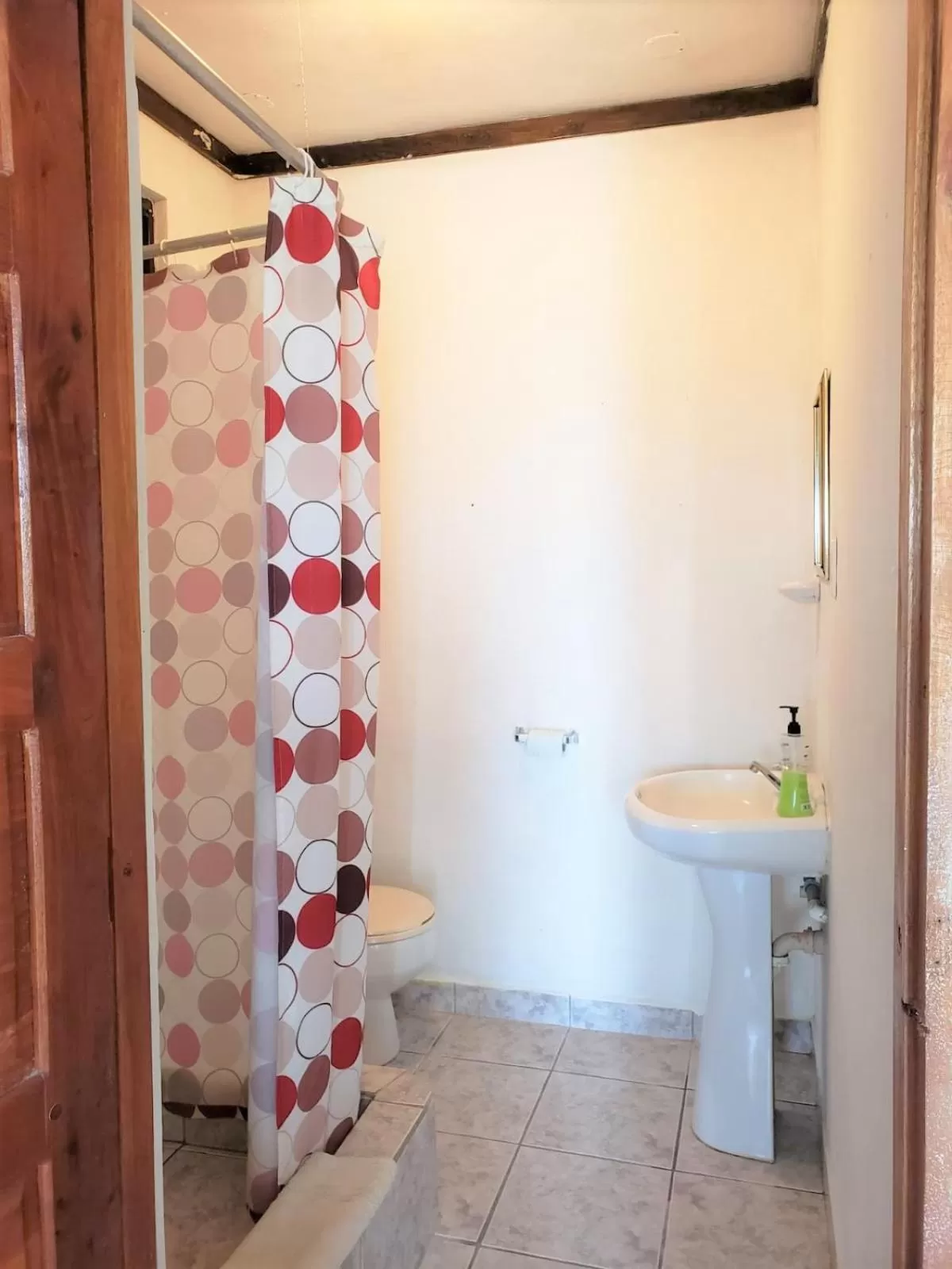 Bathroom in Beach Side Condos Caye Caulker by CCVH