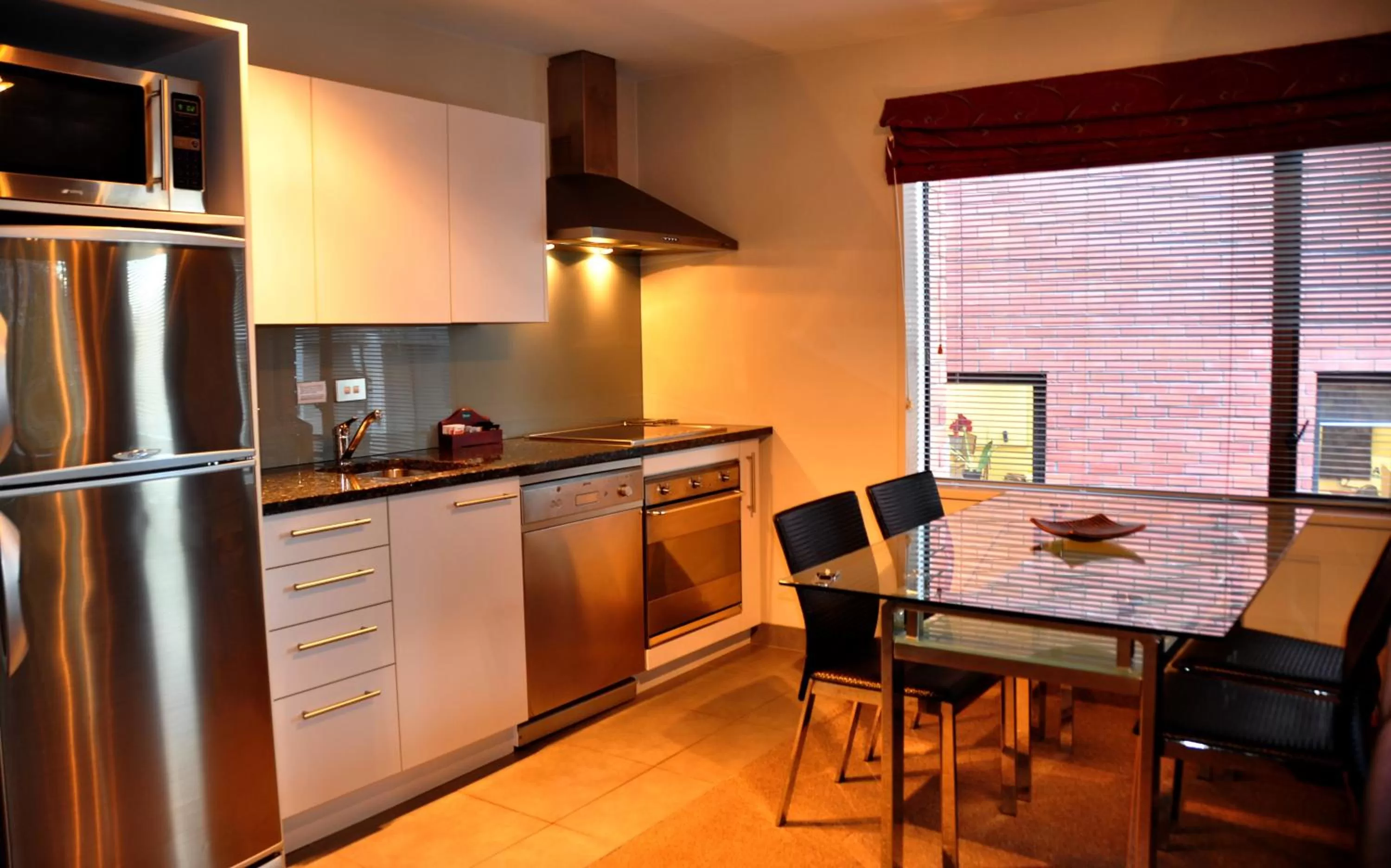 Kitchen or kitchenette in St James Apartments