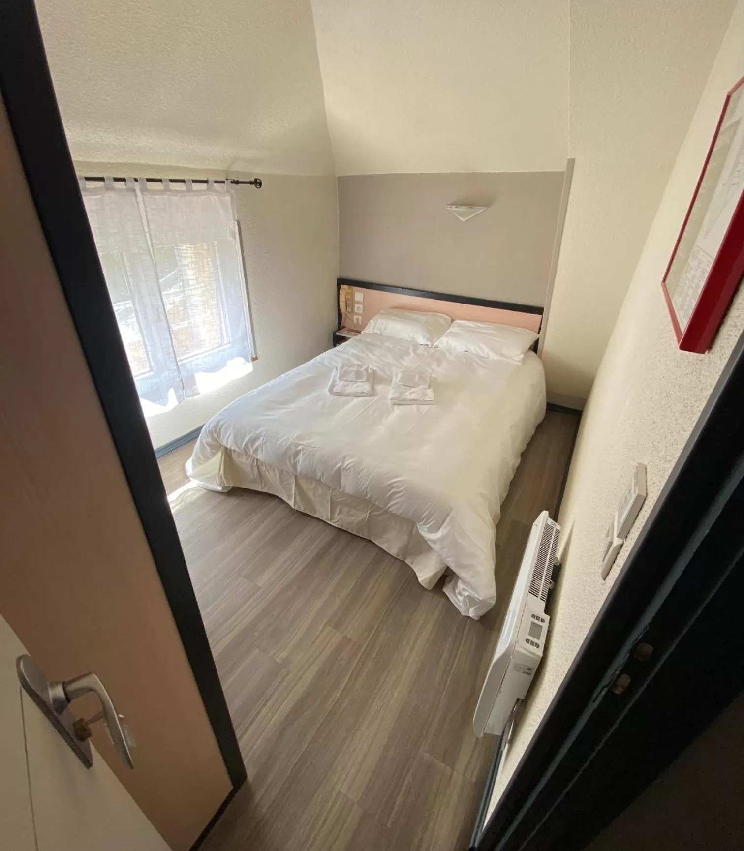 Bed in HOTEL LE FOIRAIL