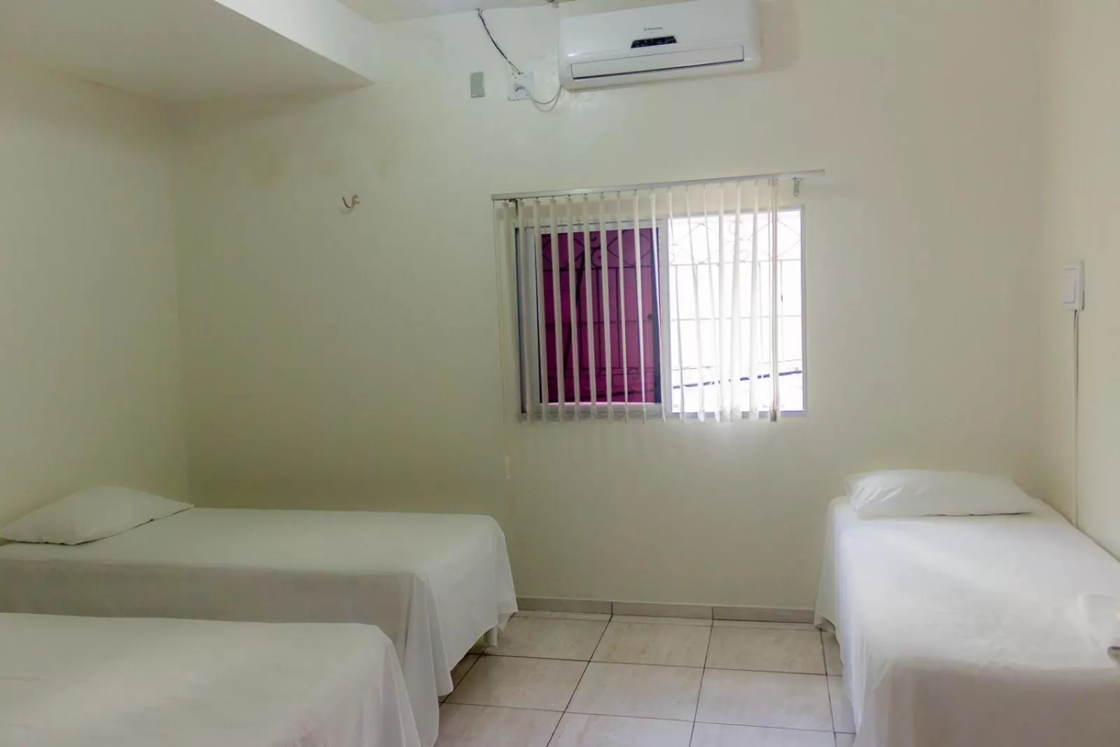 Bed in Pousada Vila do Carmo