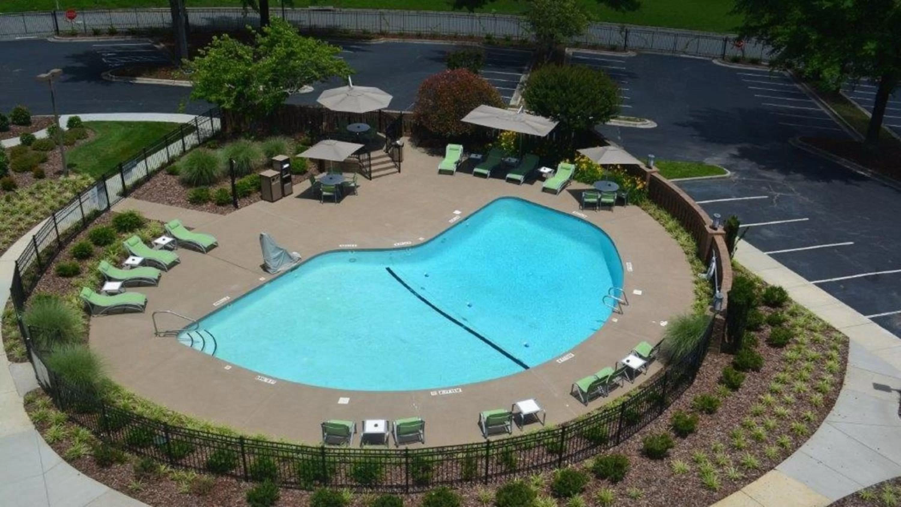 Swimming pool in Holiday Inn Greensboro Coliseum by IHG