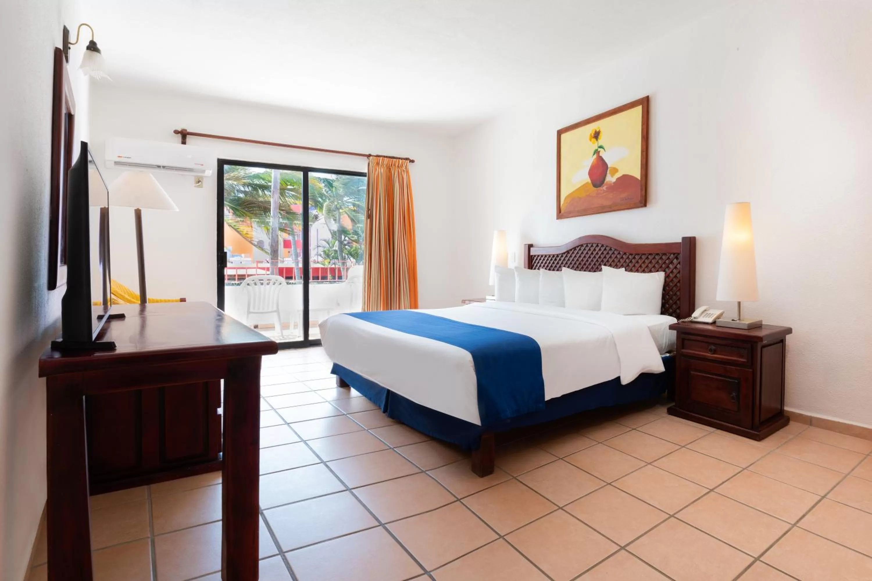 Bed in Grand Decameron Complex Bucerias, A Trademark All-Inclusive Resort