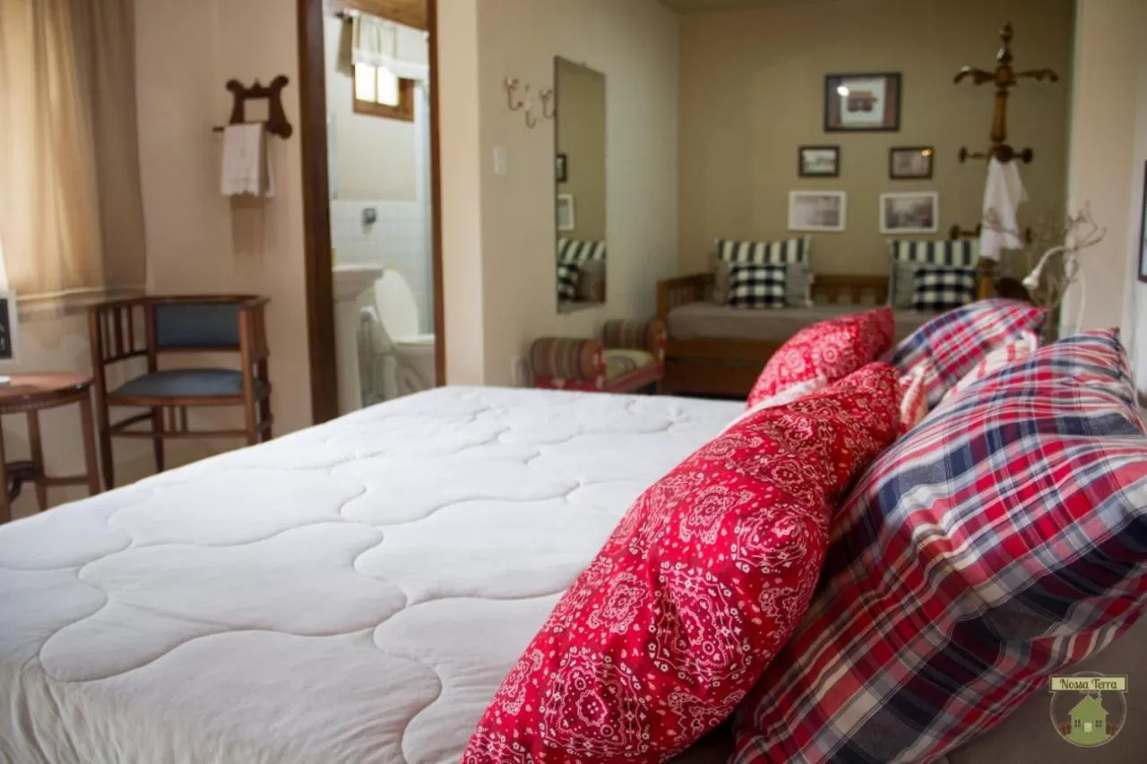 Bed in Pousada Nossa Terra