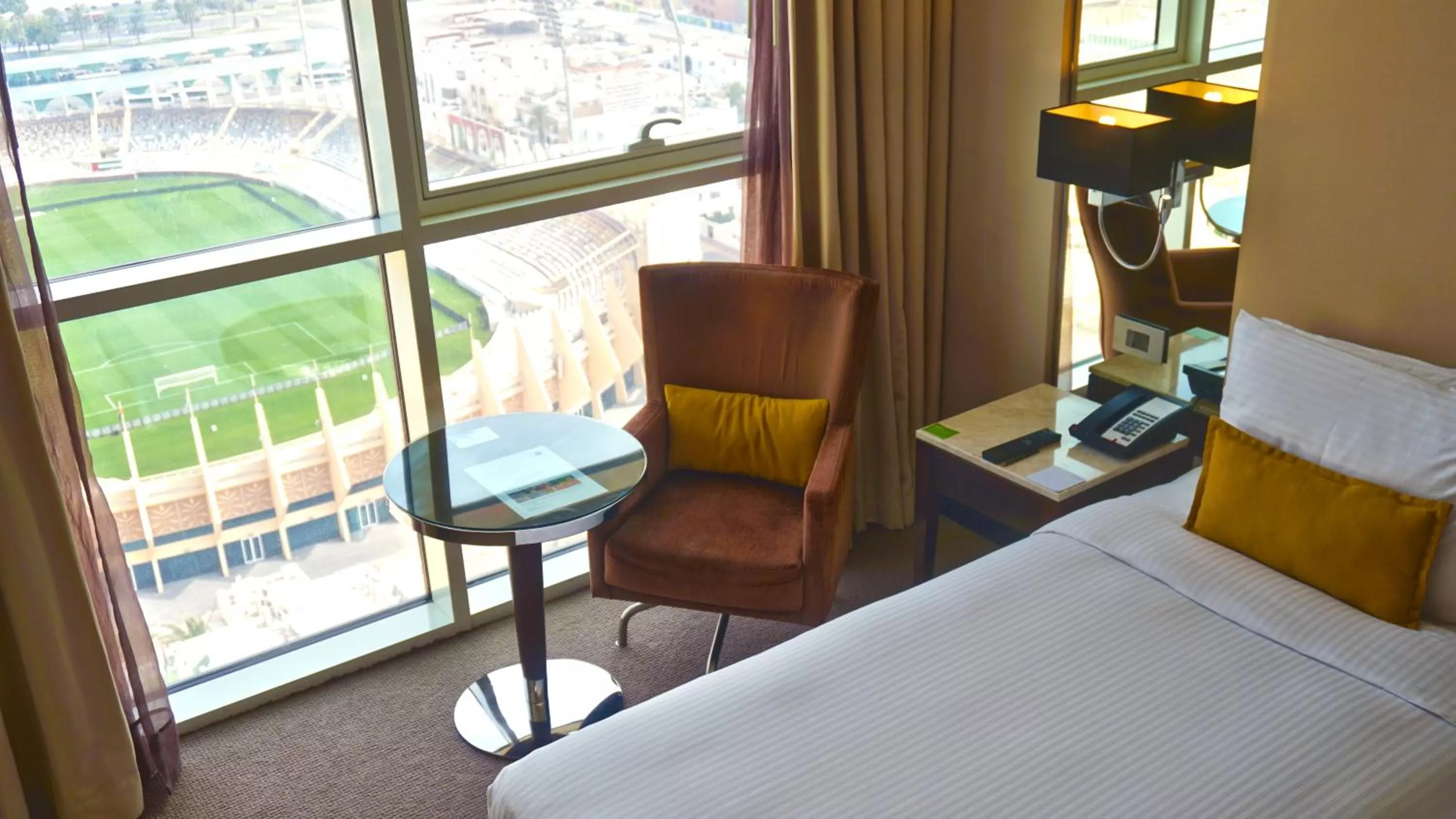 Seating area, Bed in Centro Al Manhal by Rotana