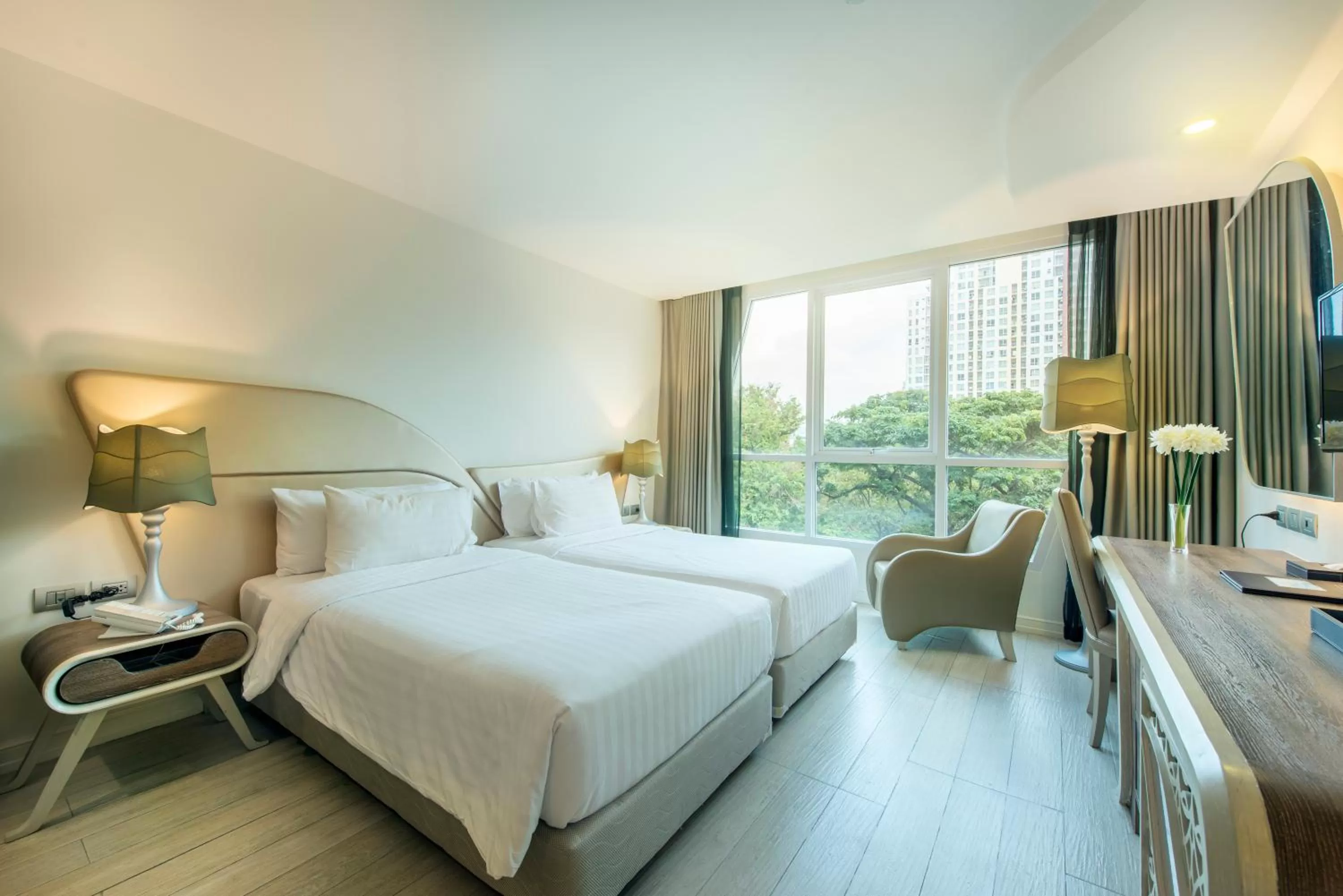 Bed in Le Tada Parkview Hotel