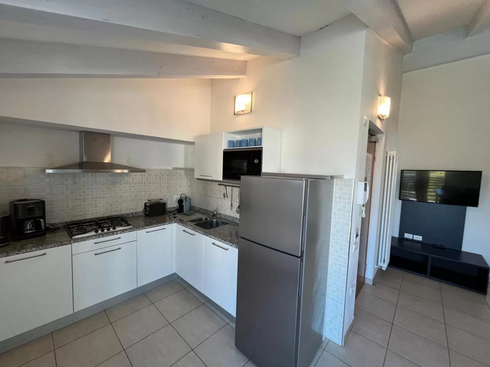 Kitchen or kitchenette in 4 Limoni Apartment Resort