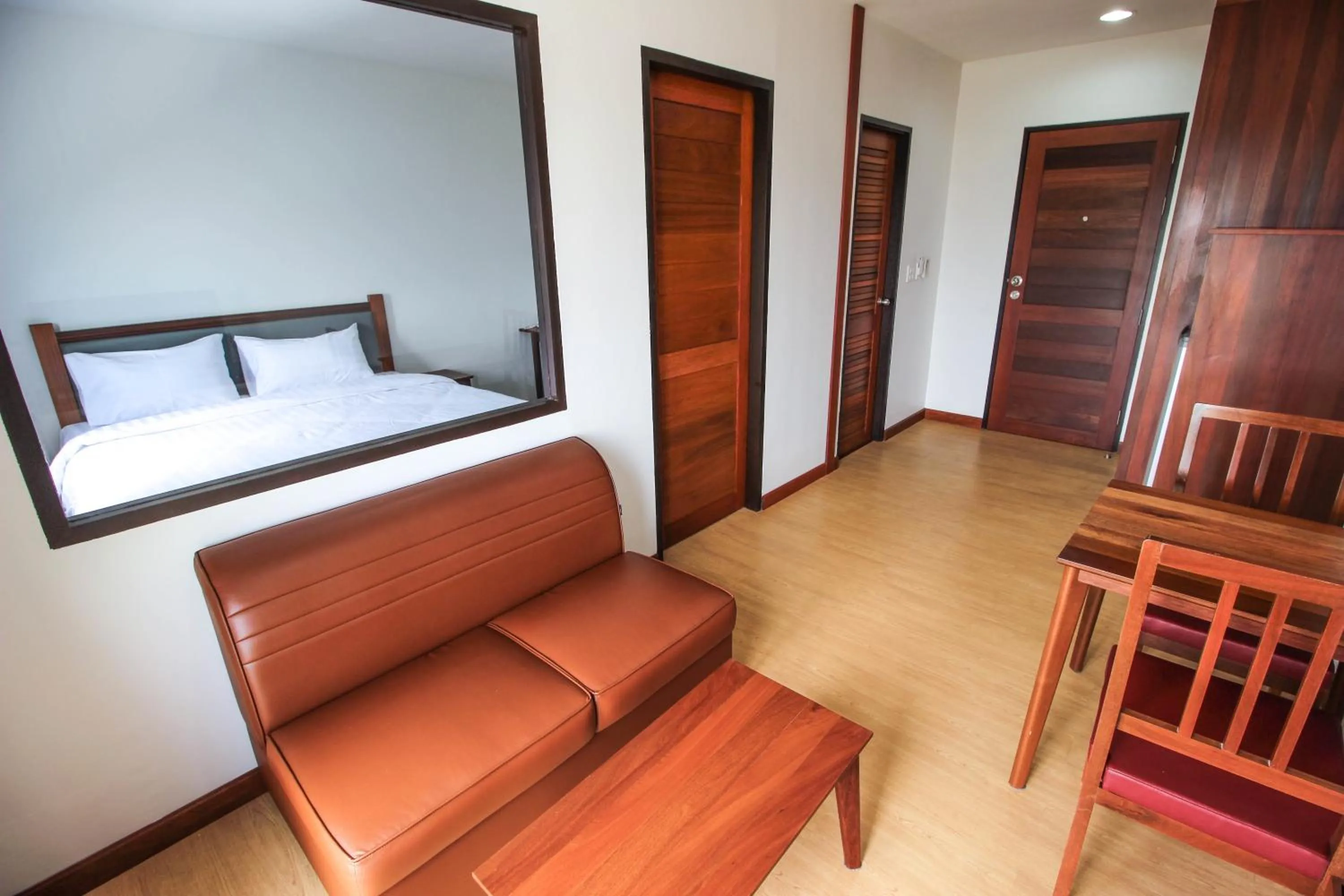 Bed in Tai-Shan Suites