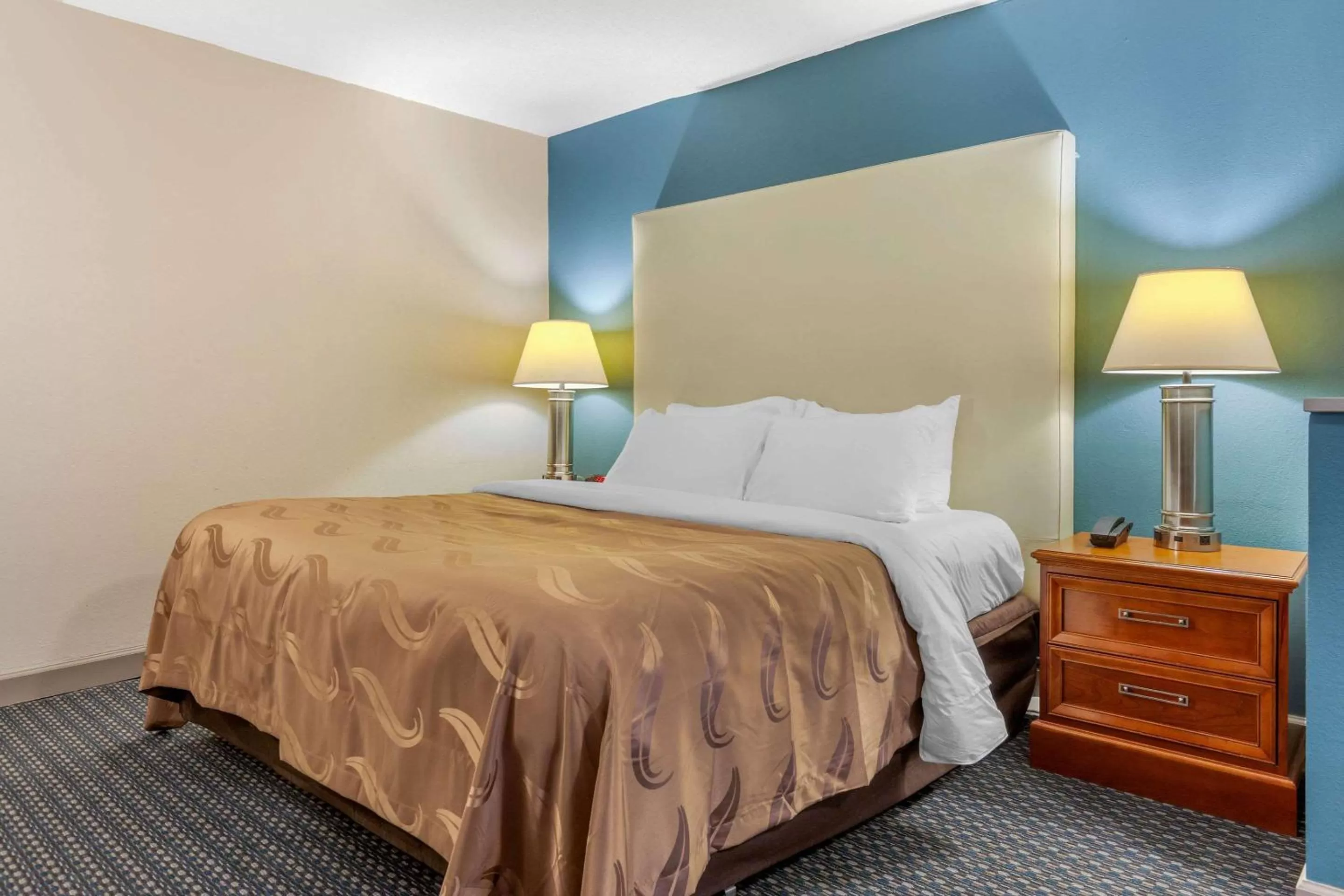 Photo of the whole room, Bed in Quality Inn & Suites Apex - Holly Springs NC
