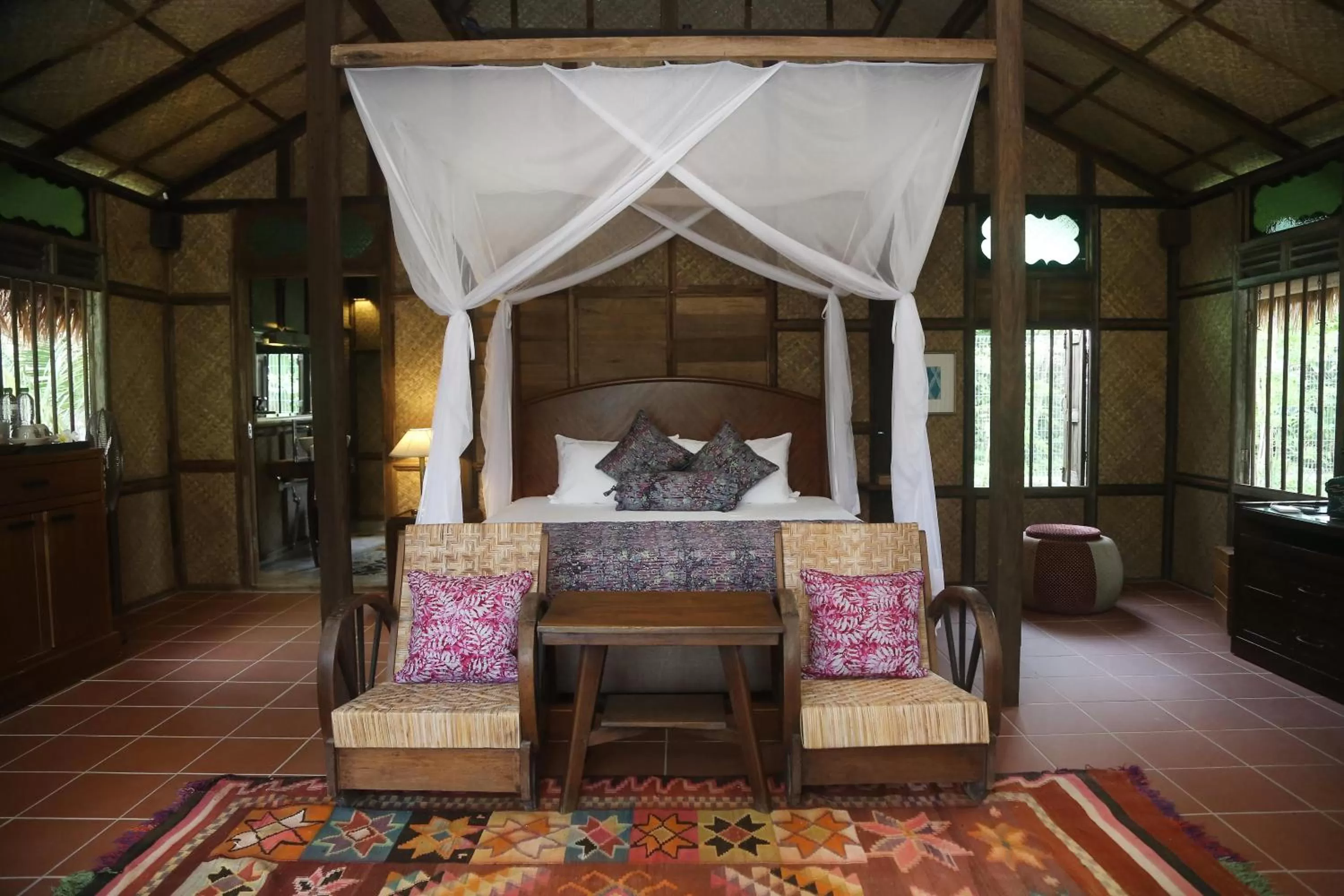 Bed in Kunang Kunang Heritage Villas