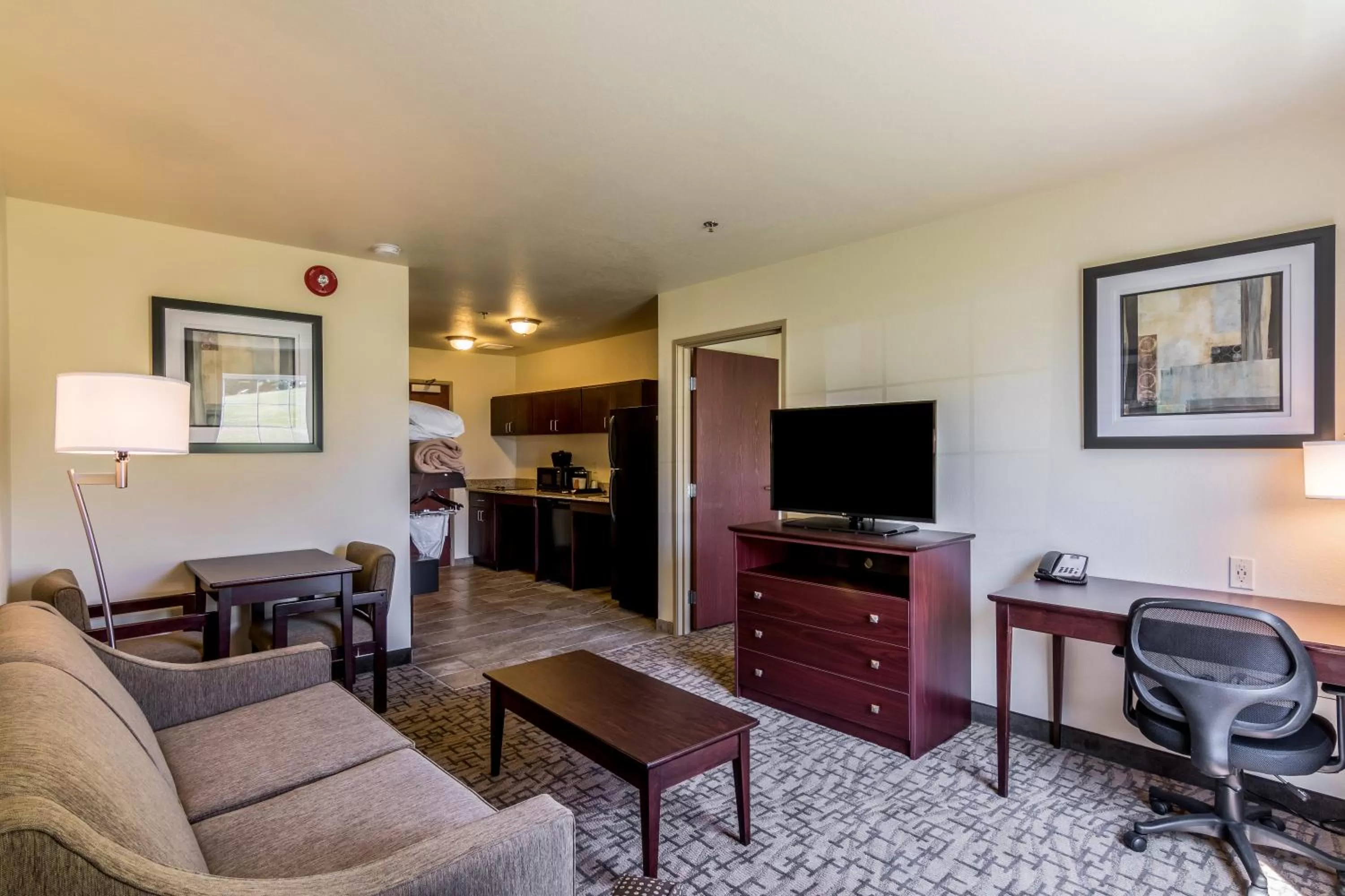 Living room in Cobblestone Inn & Suites - Barron