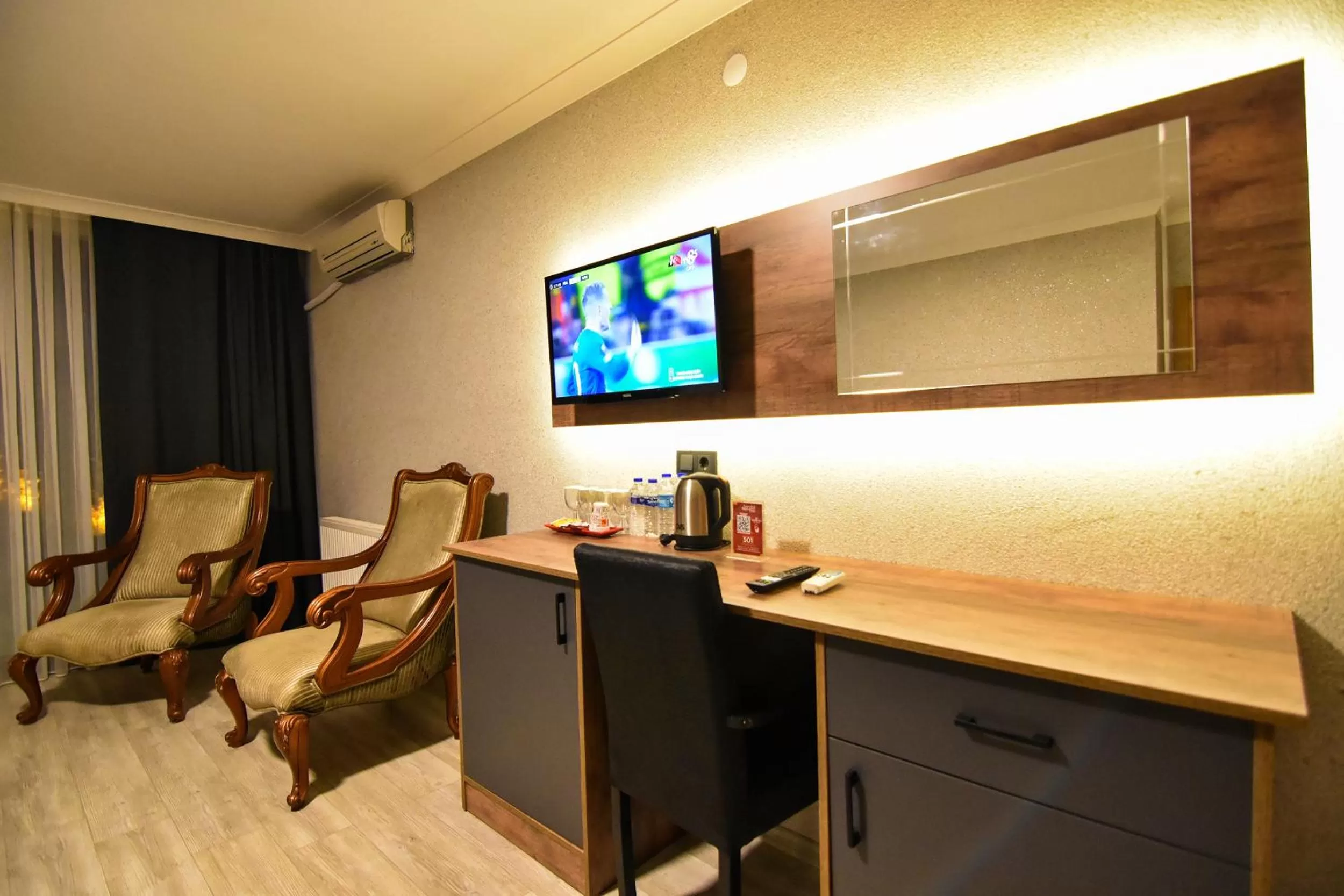TV and multimedia, TV/Entertainment Center in Sandal Otel
