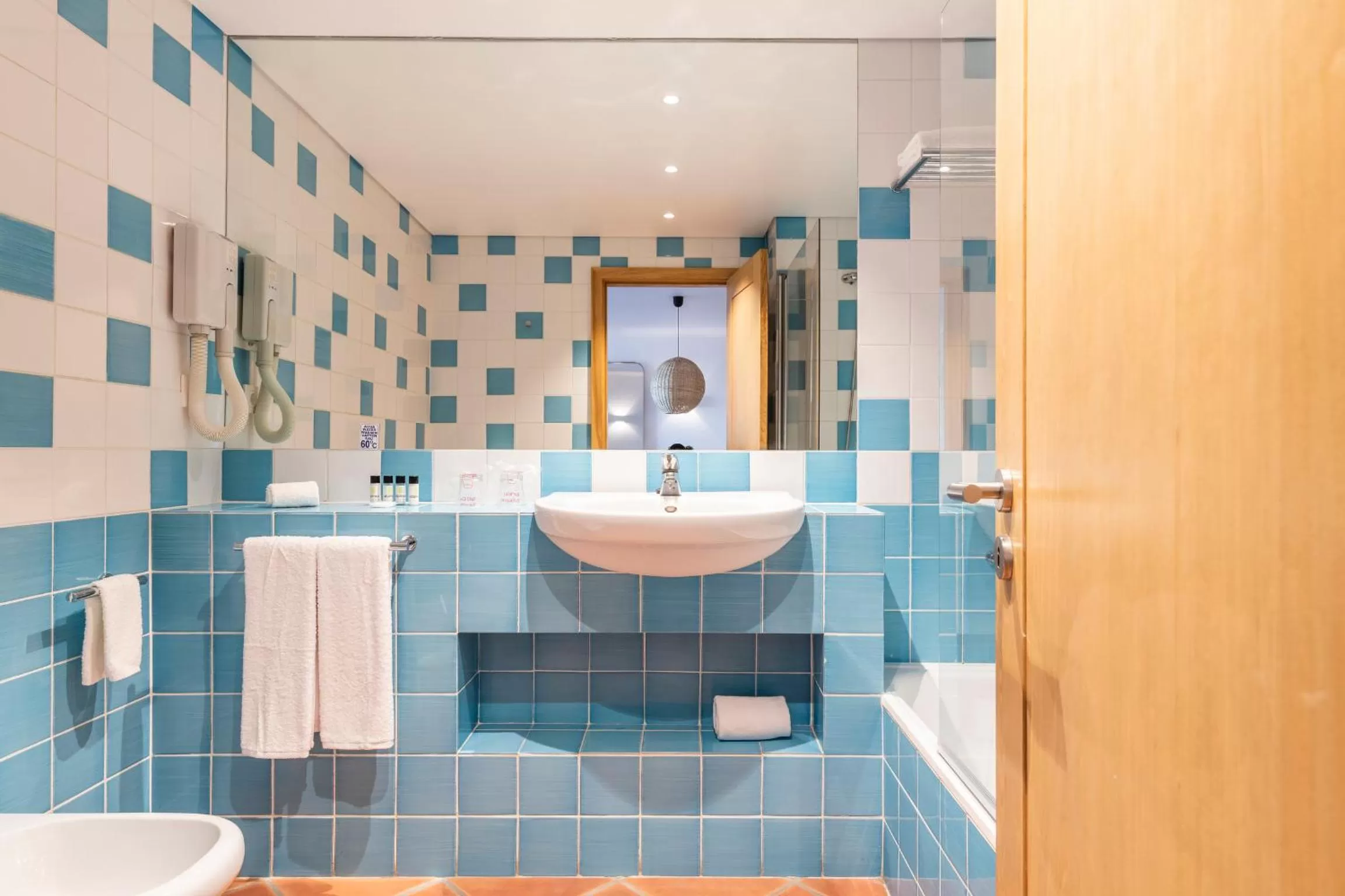 Toilet in The Patio Suite Hotel