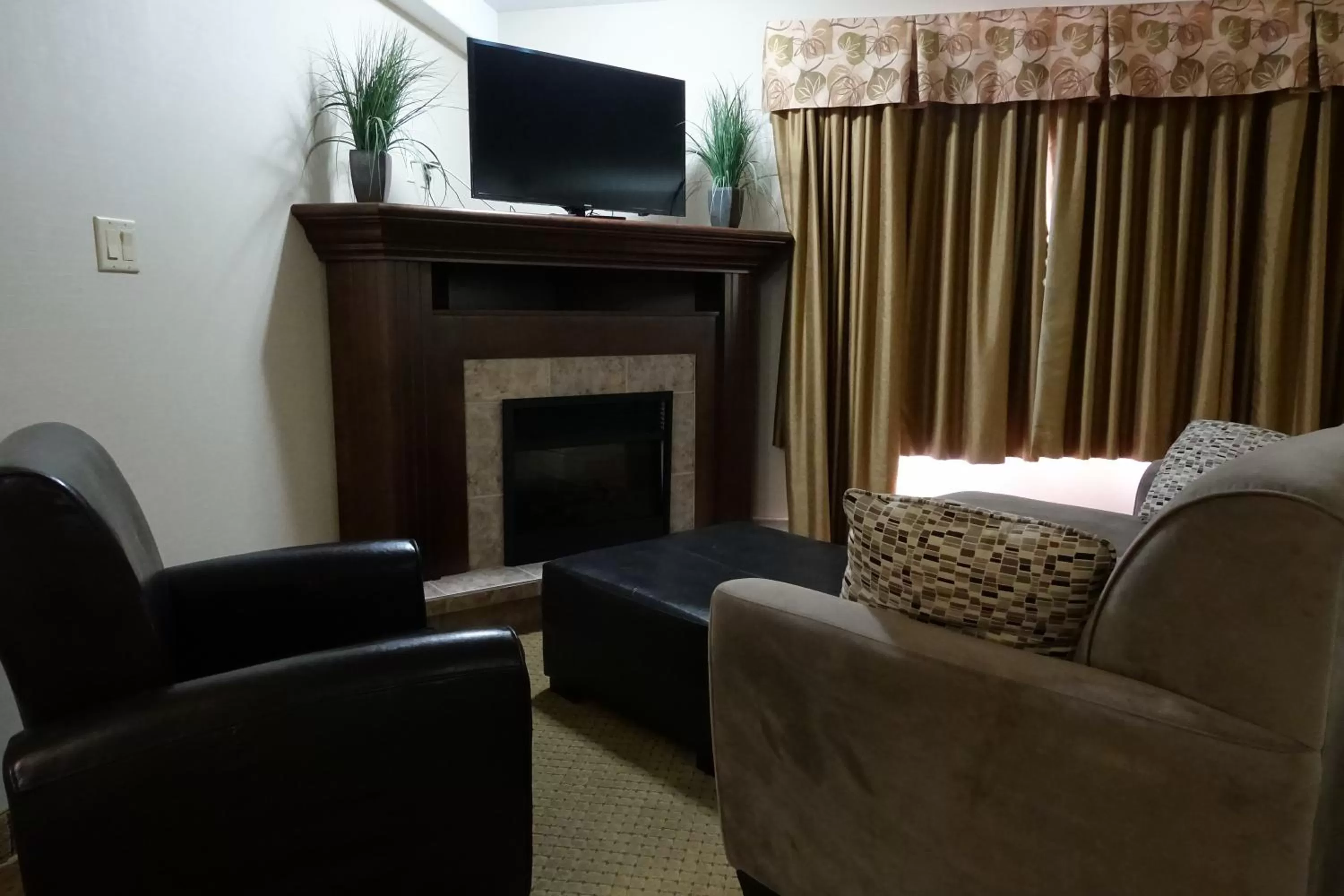 Seating area in Ramada by Wyndham Weyburn