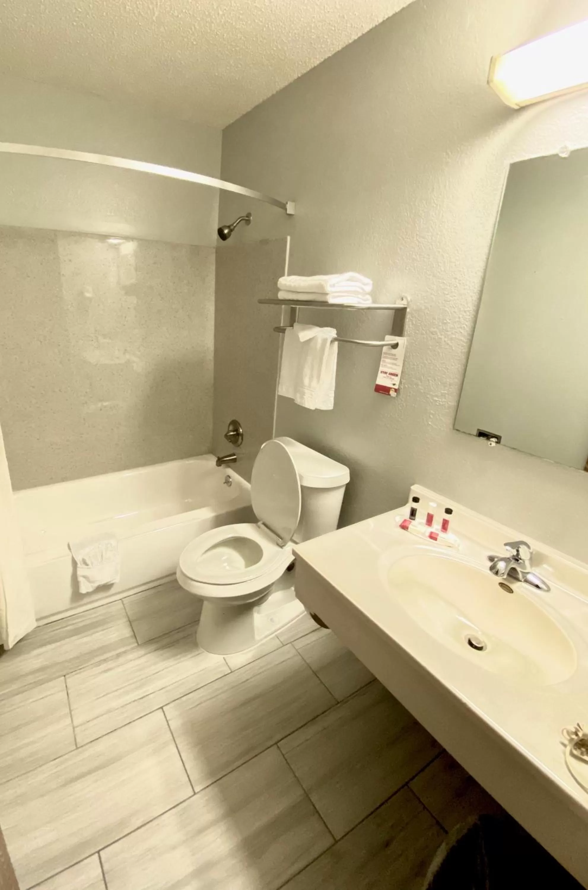 Bathroom in Super 8 by Wyndham Hays KS