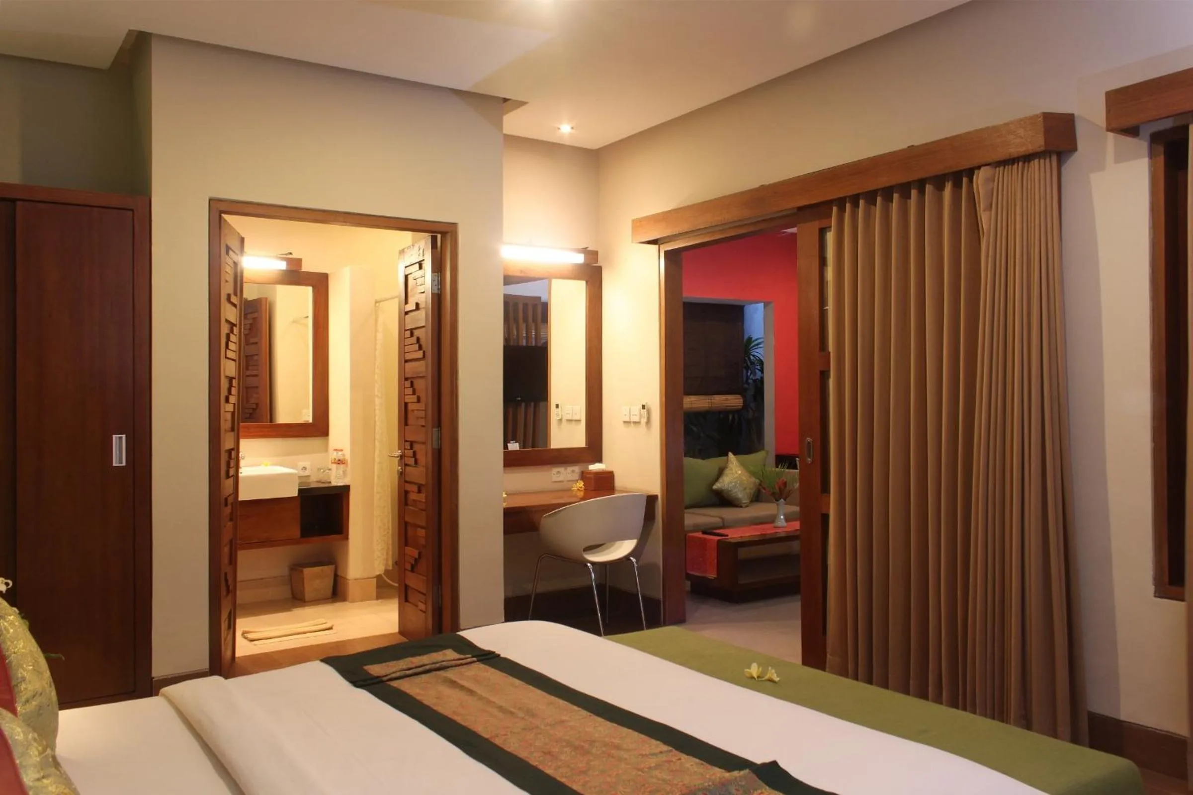 Photo of the whole room, Bed in The Green Zhurga Suite Seminyak
