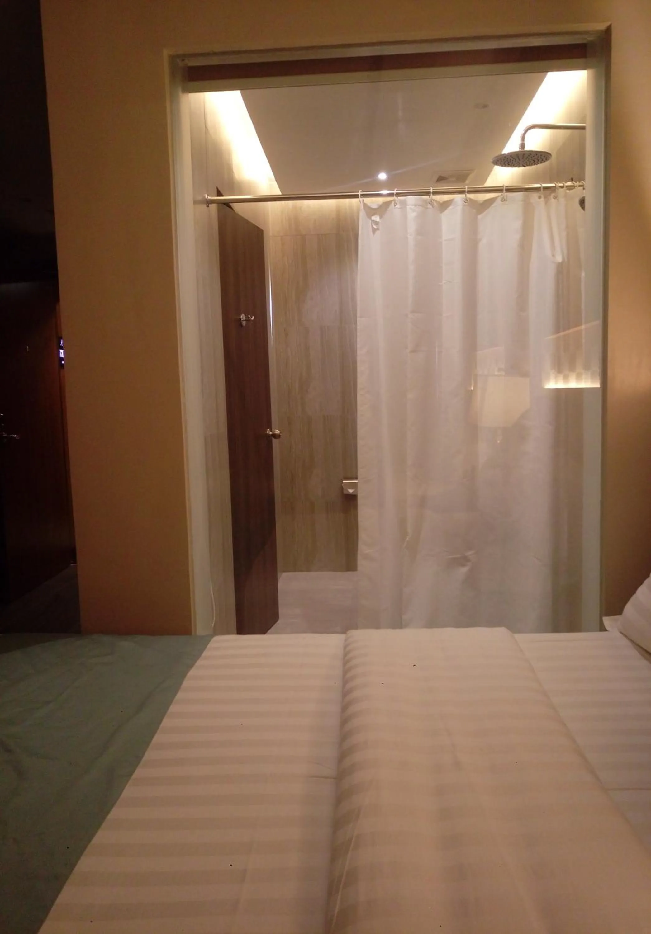 Bed in J7 Plaza Hotel