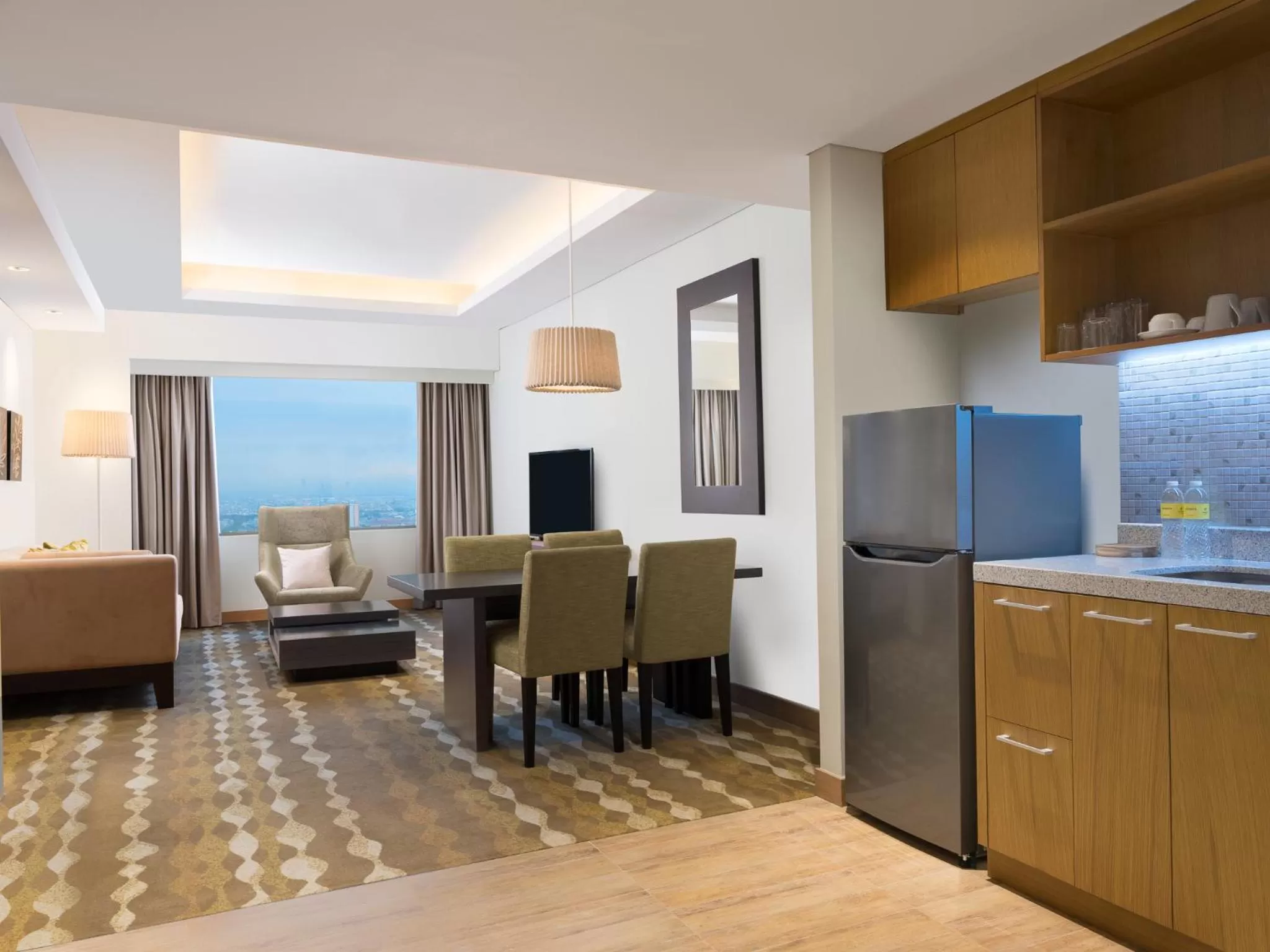 Seating area, Bed in Holiday Inn & Suites Jakarta Gajah Mada by IHG