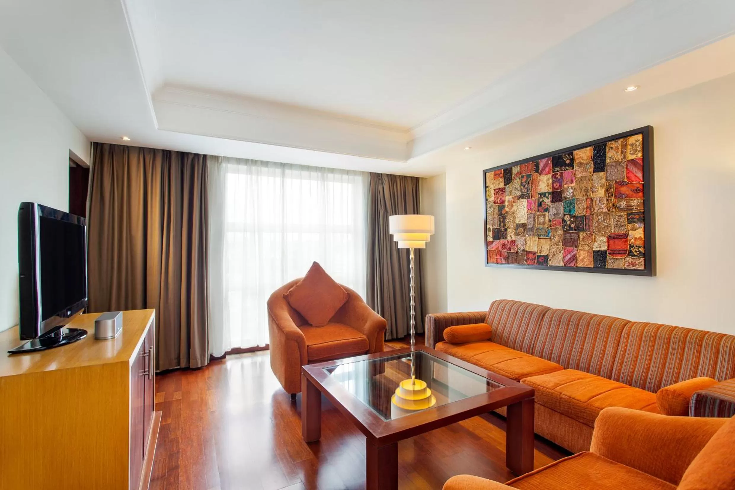 Communal lounge/ TV room in Novotel Semarang