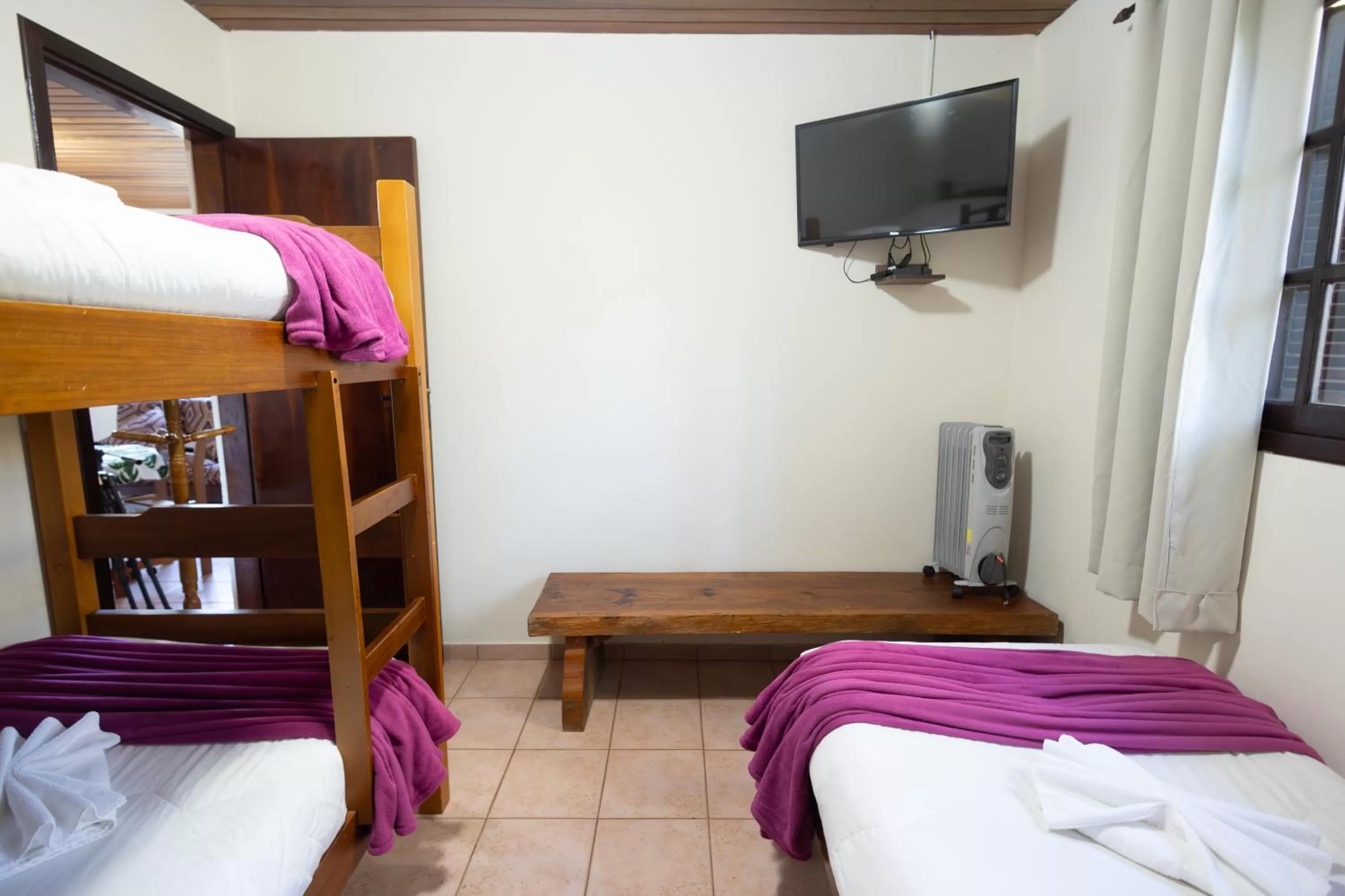 Bed in Pousada 3 Pinheiros