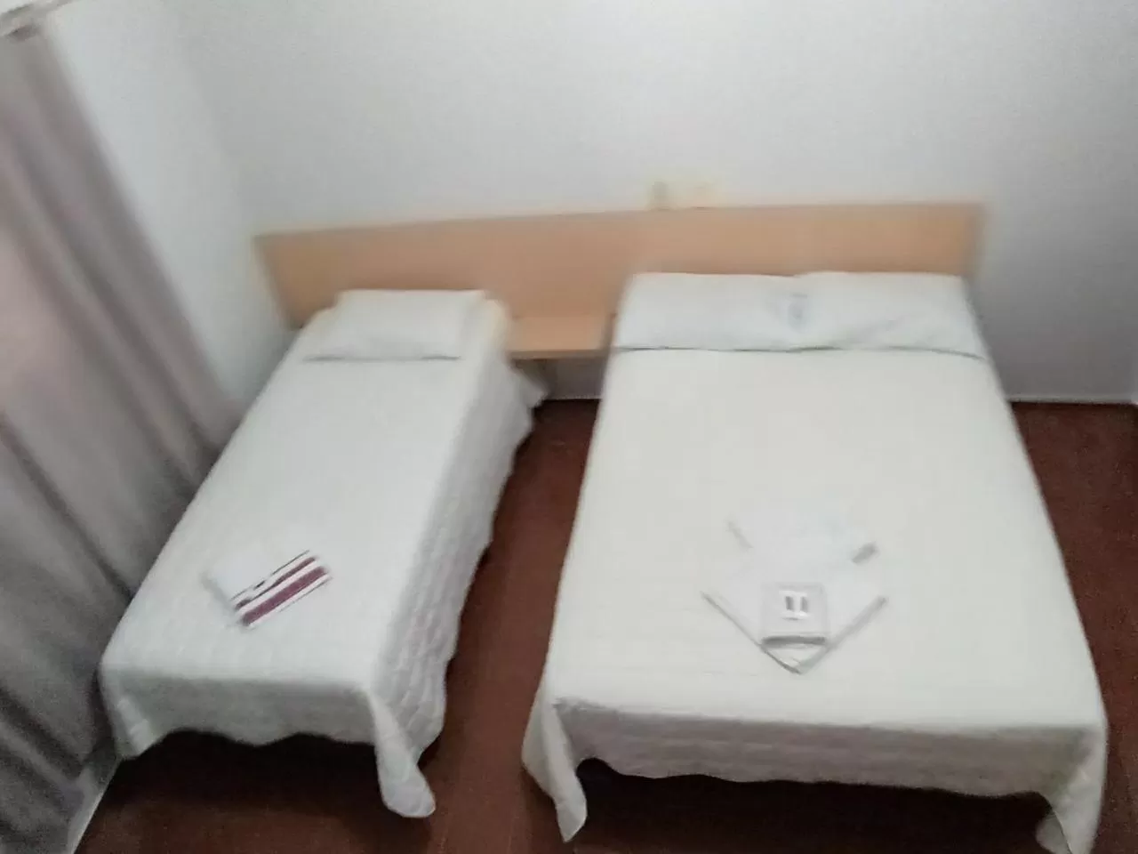 Bed in Giroto Hotel
