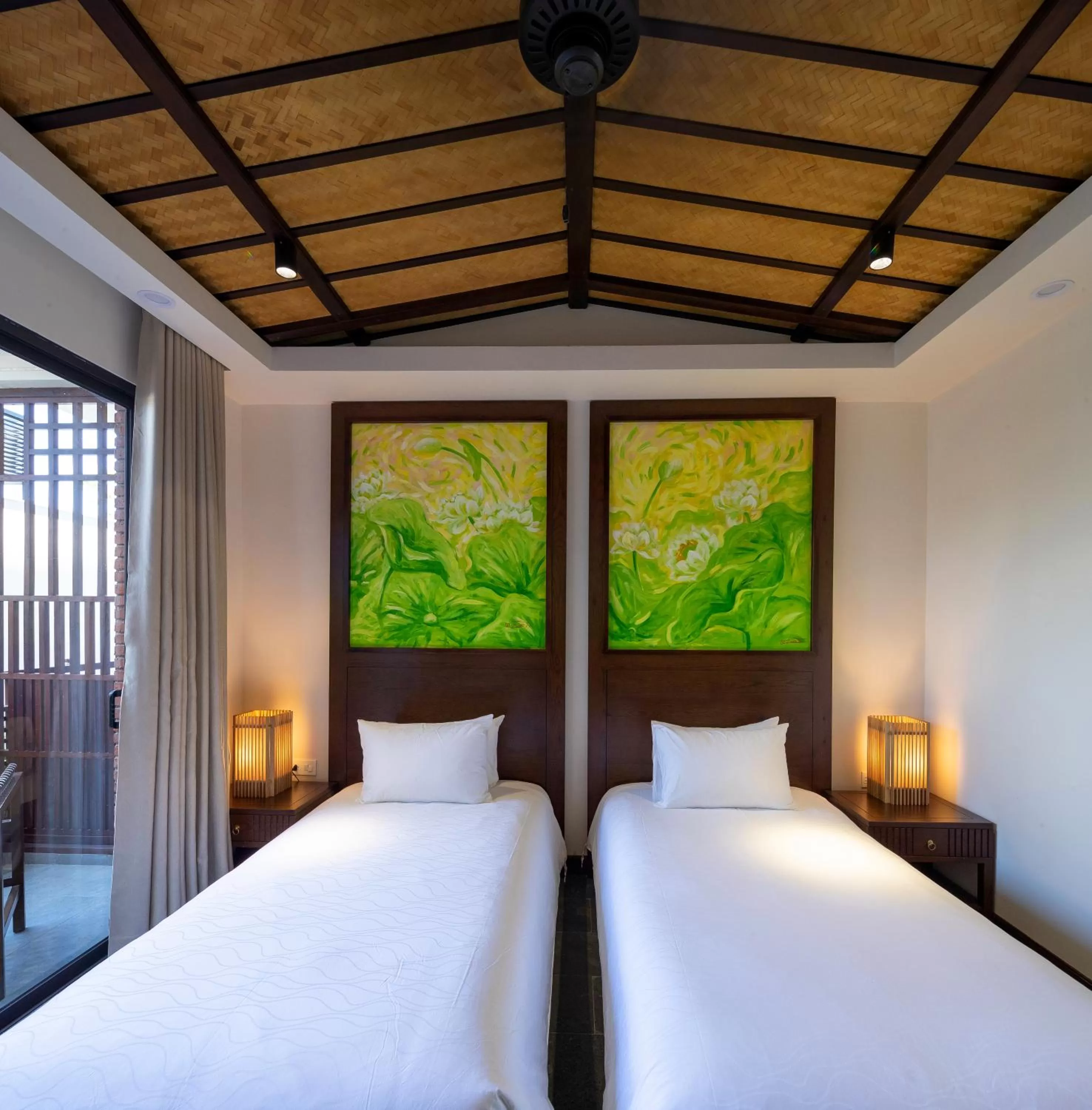 Bed in Nghê Prana Hotel and Spa Hoi An
