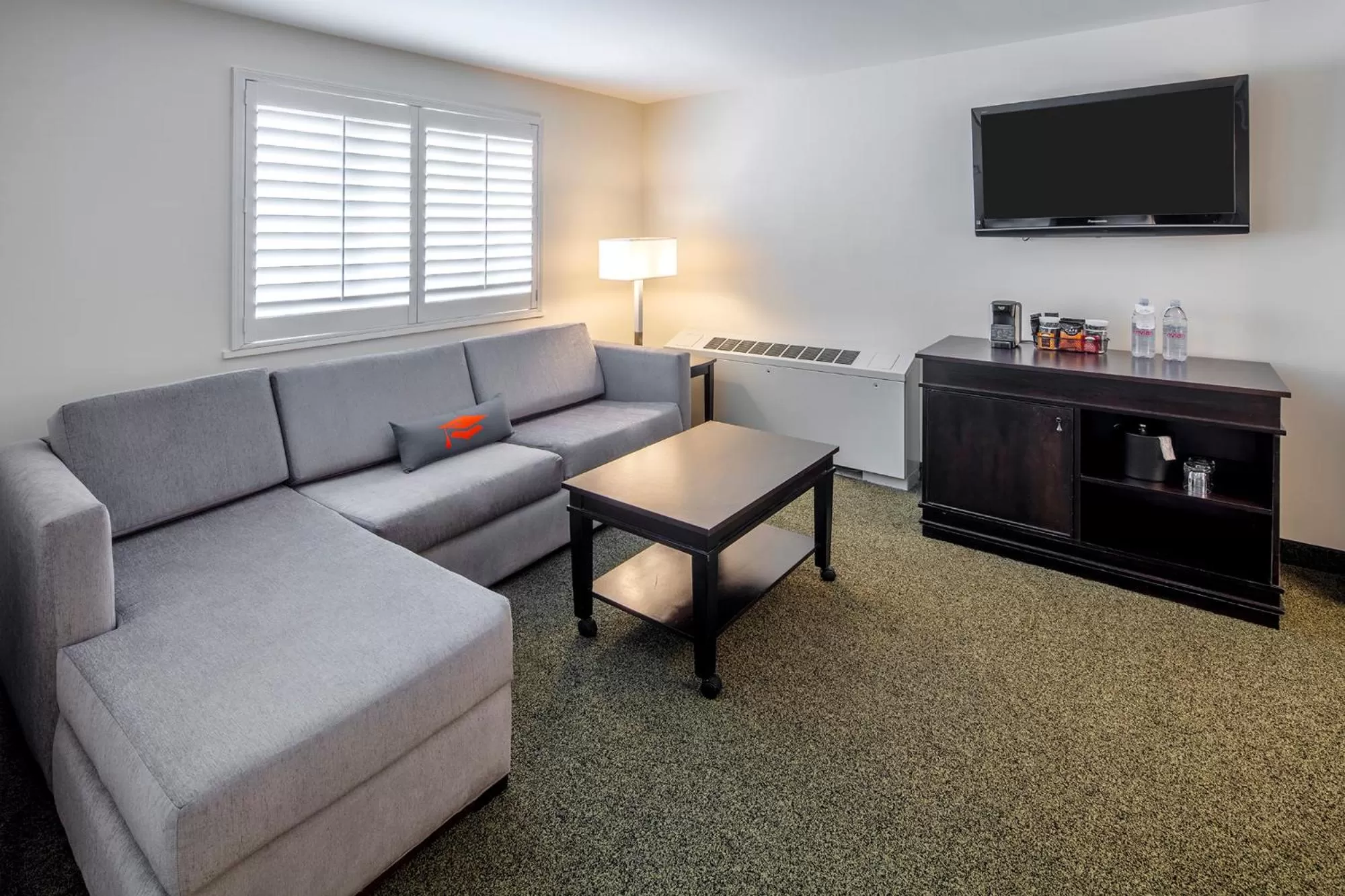 Seating area in Collegian Hotel & Suites, Trademark Collection by Wyndham