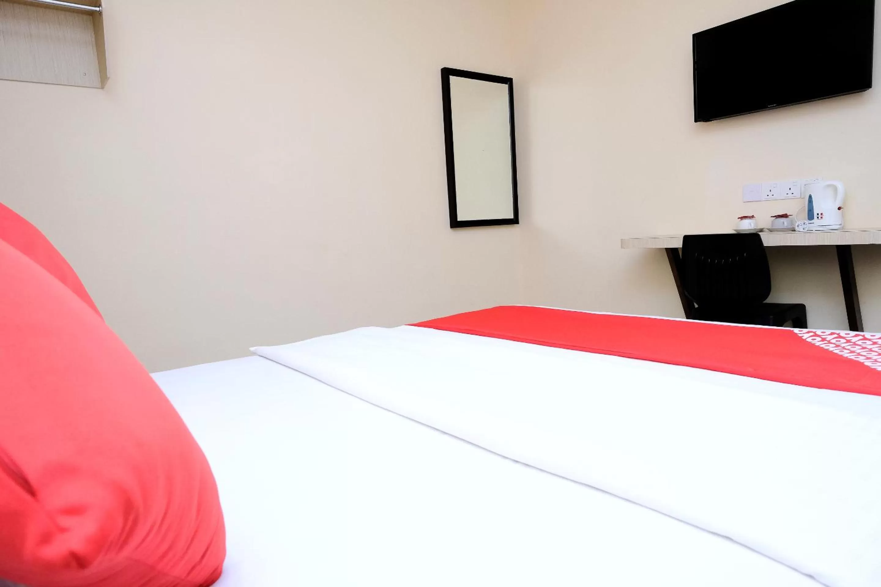 Bedroom in Super OYO 635 Seven Days Hotel