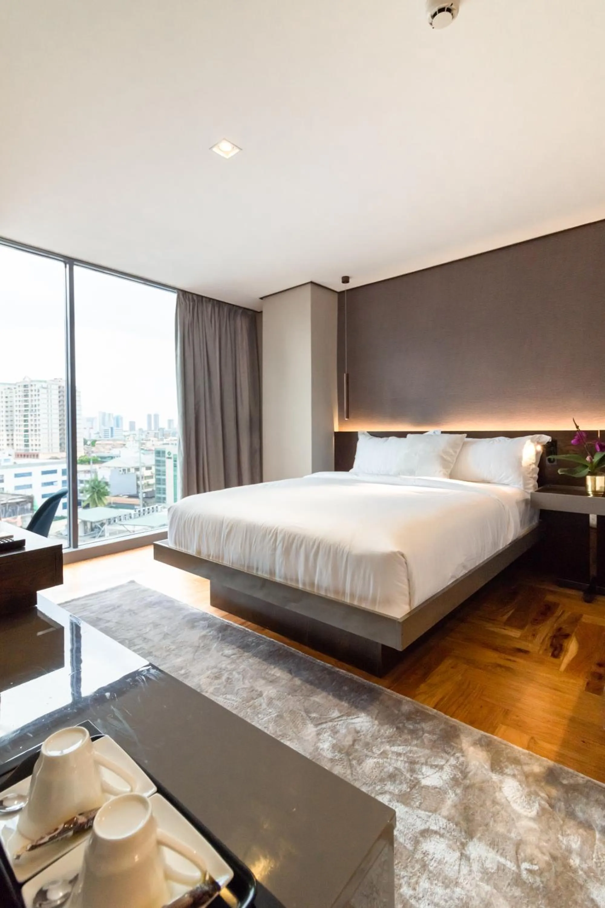 Bed in Ramada Encore by Wyndham Makati