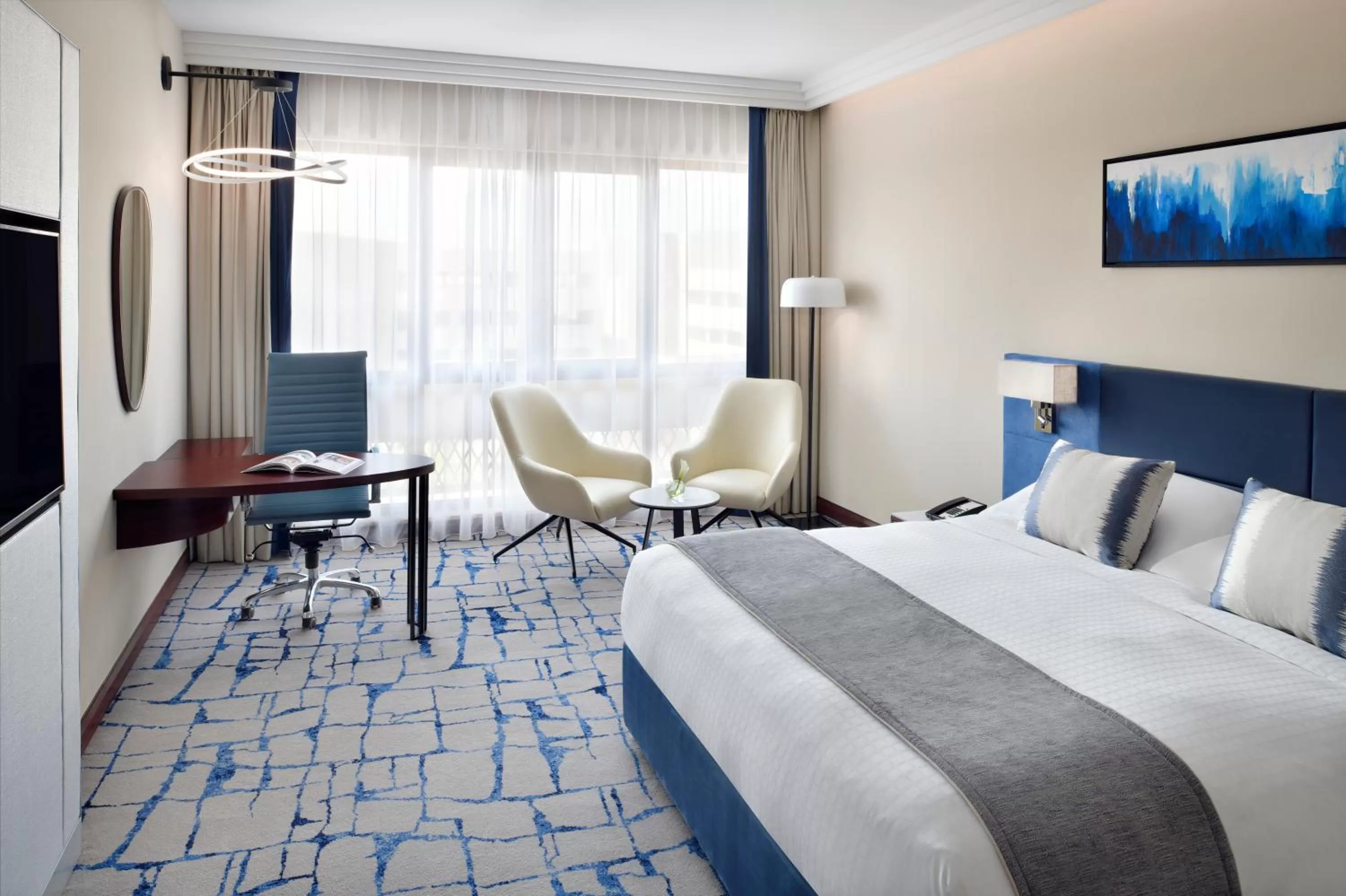 Photo of the whole room, Bed in Mövenpick Hotel & Apartments Bur Dubai