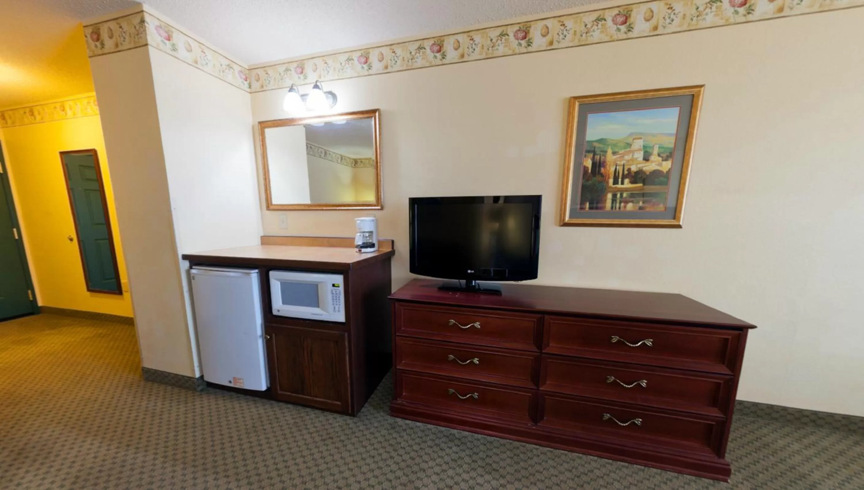 TV and multimedia in Country Inn & Suites by Radisson, St Cloud East, MN