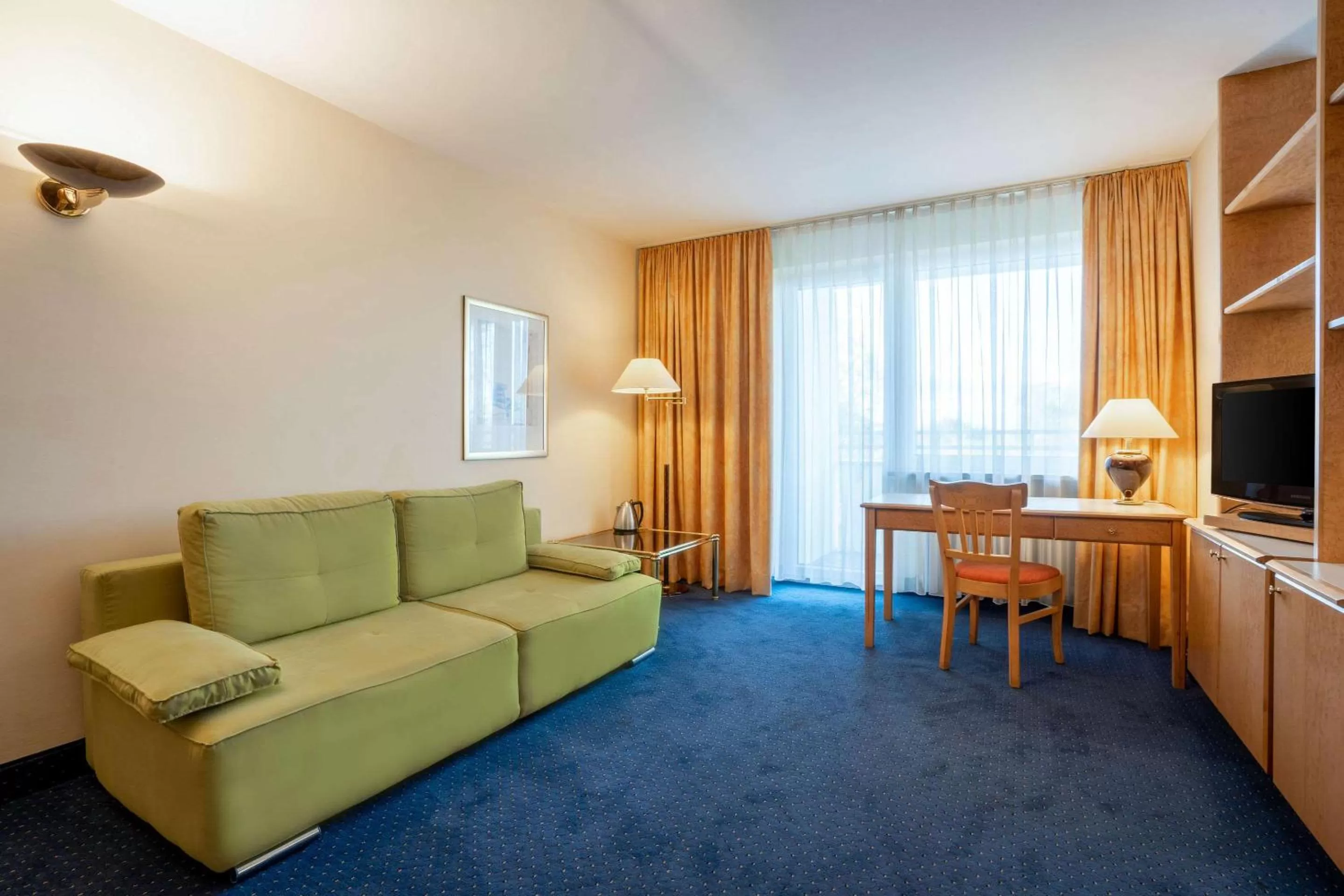 Bedroom, Seating Area in Styles Hotel Unterföhring