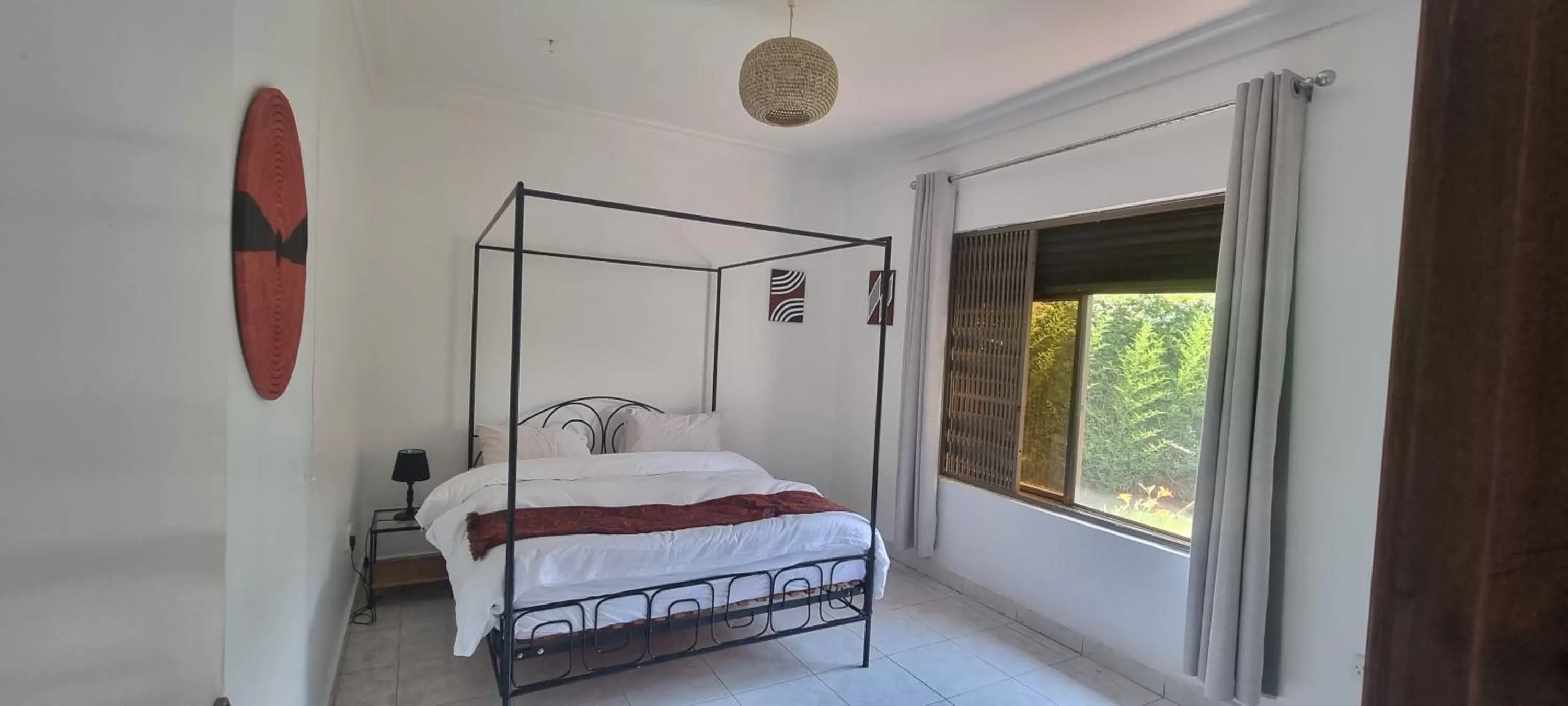 Photo of the whole room, Bed in Nature Kigali