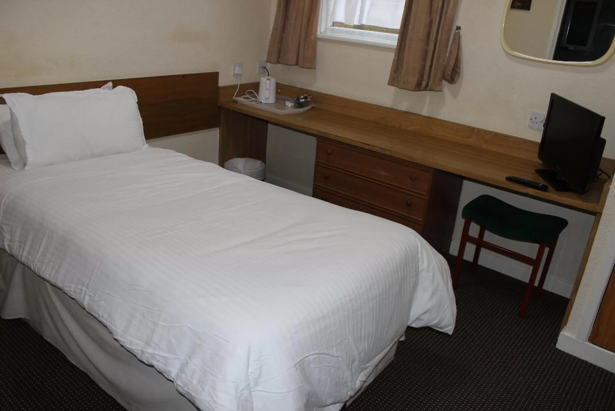 Bed in The Premier Lodge