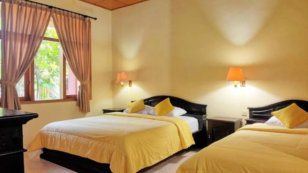 Bed in Masainn Hotel Kuta