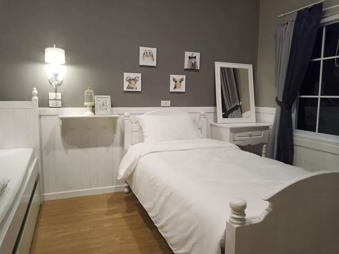 Bed in Baan JaoKorKluay บ้านเจ้ากอกล้วย