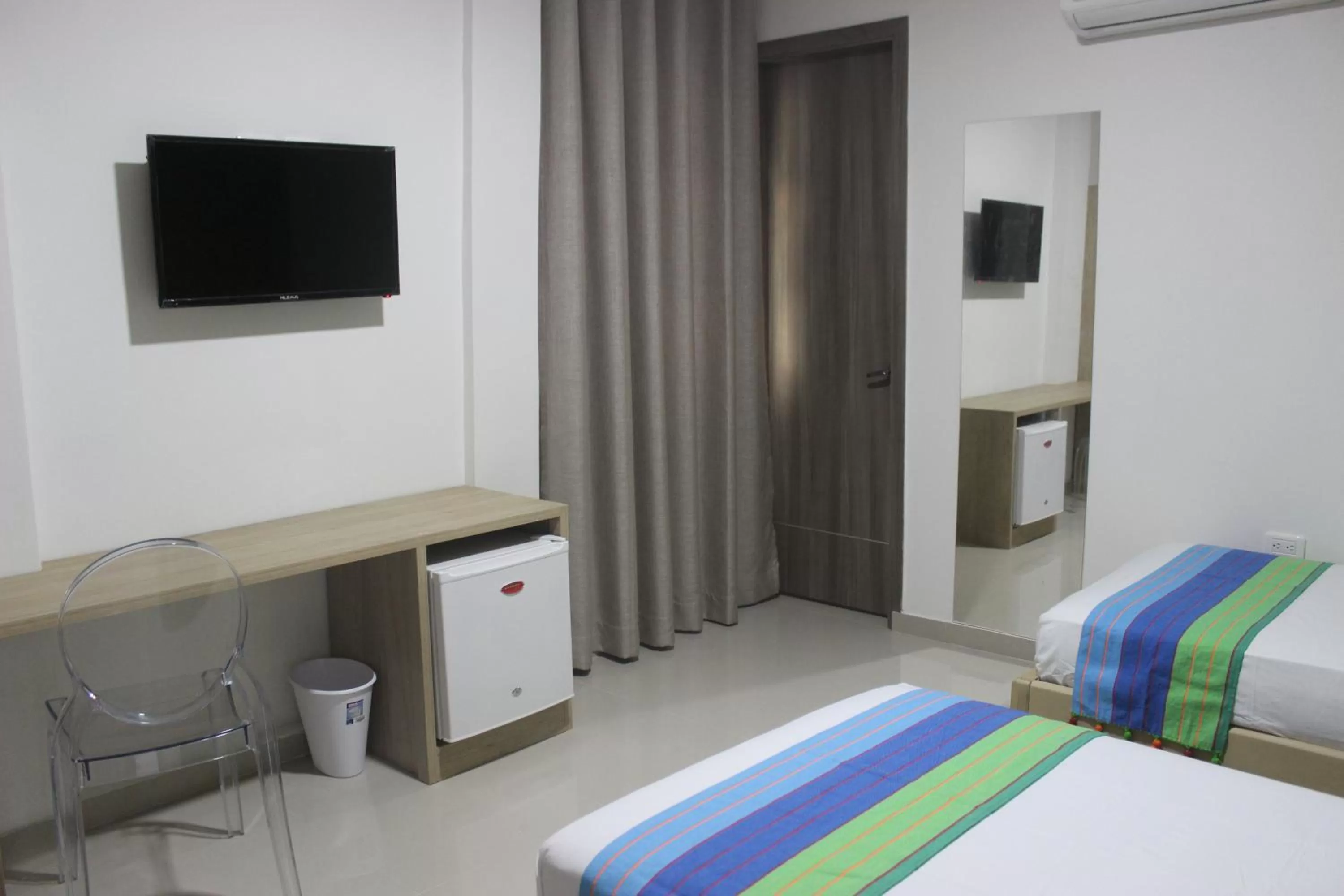 TV and multimedia, Bed in Hotel Emerawaa