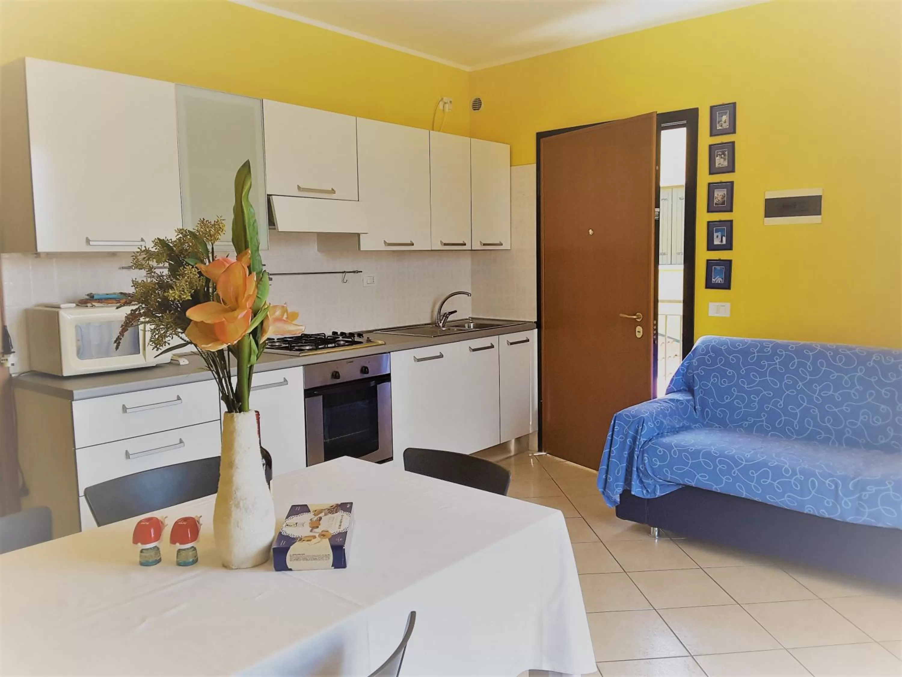Kitchen/Kitchenette in Villaggio dei Fiori Apart- Hotel 3 Stars - Family Resort