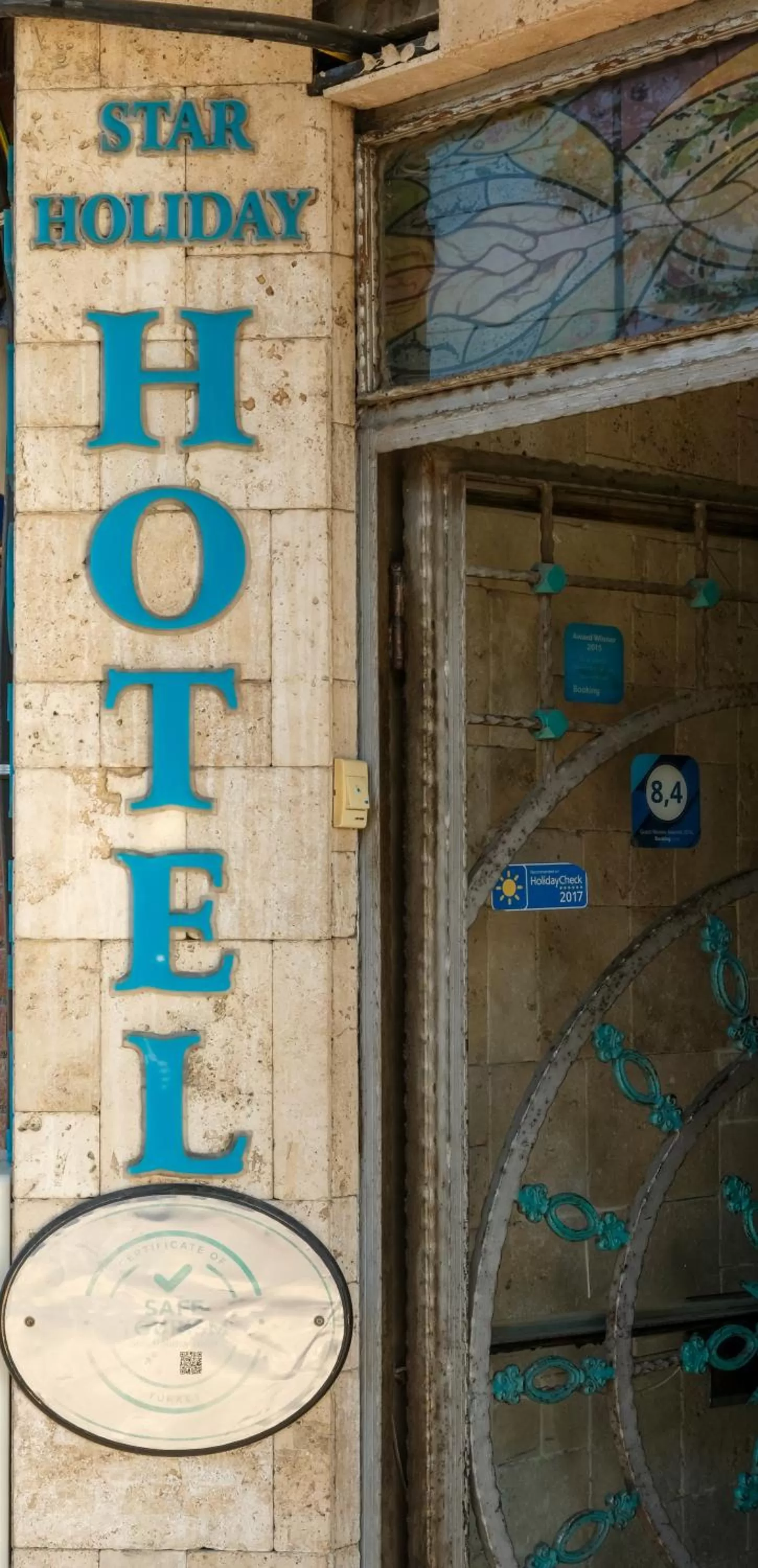 Property logo or sign in Star Holiday Hotel