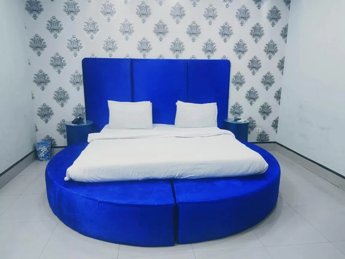 Bed in Hotel Grace inn