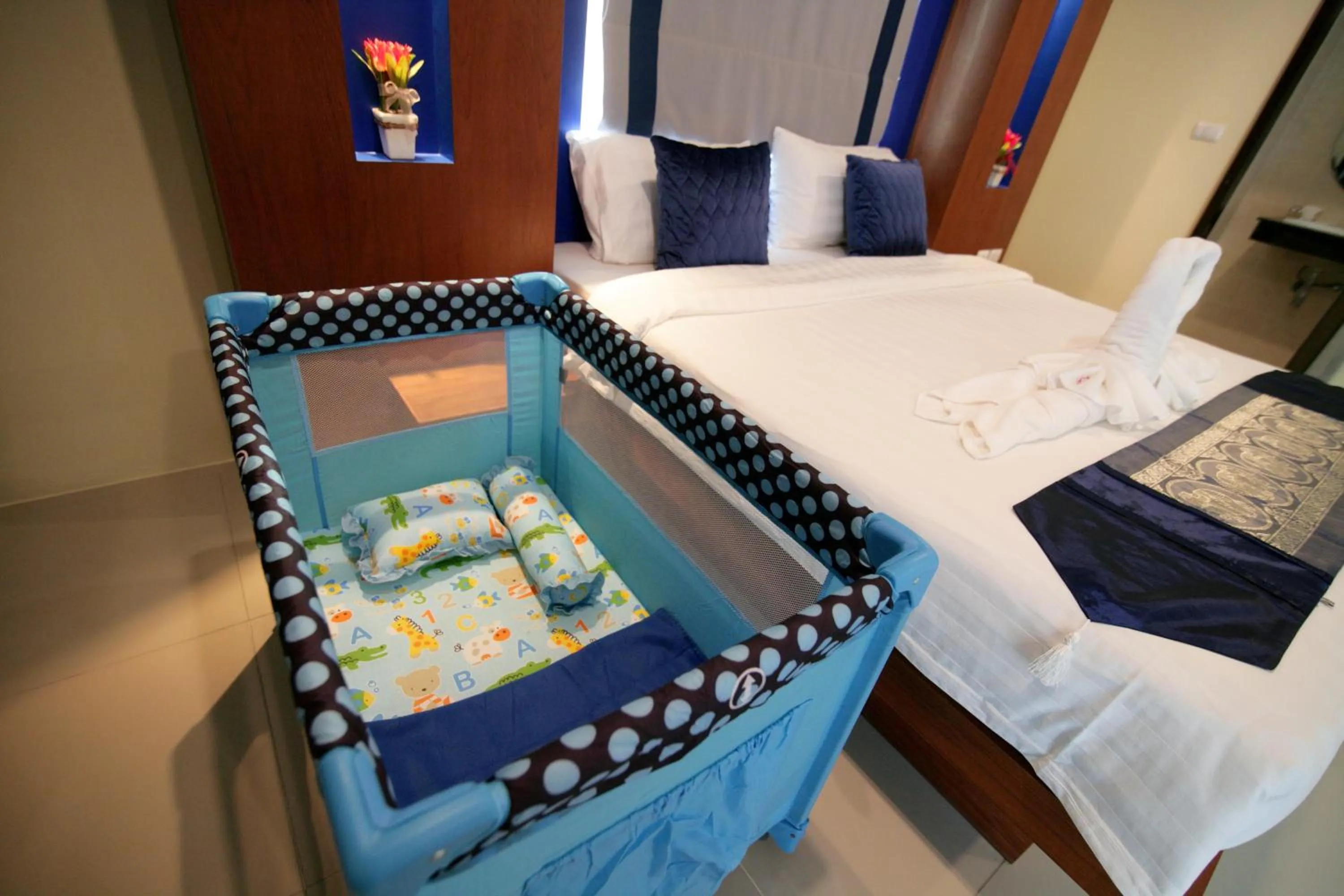 Bed in Calypso Patong Hotel