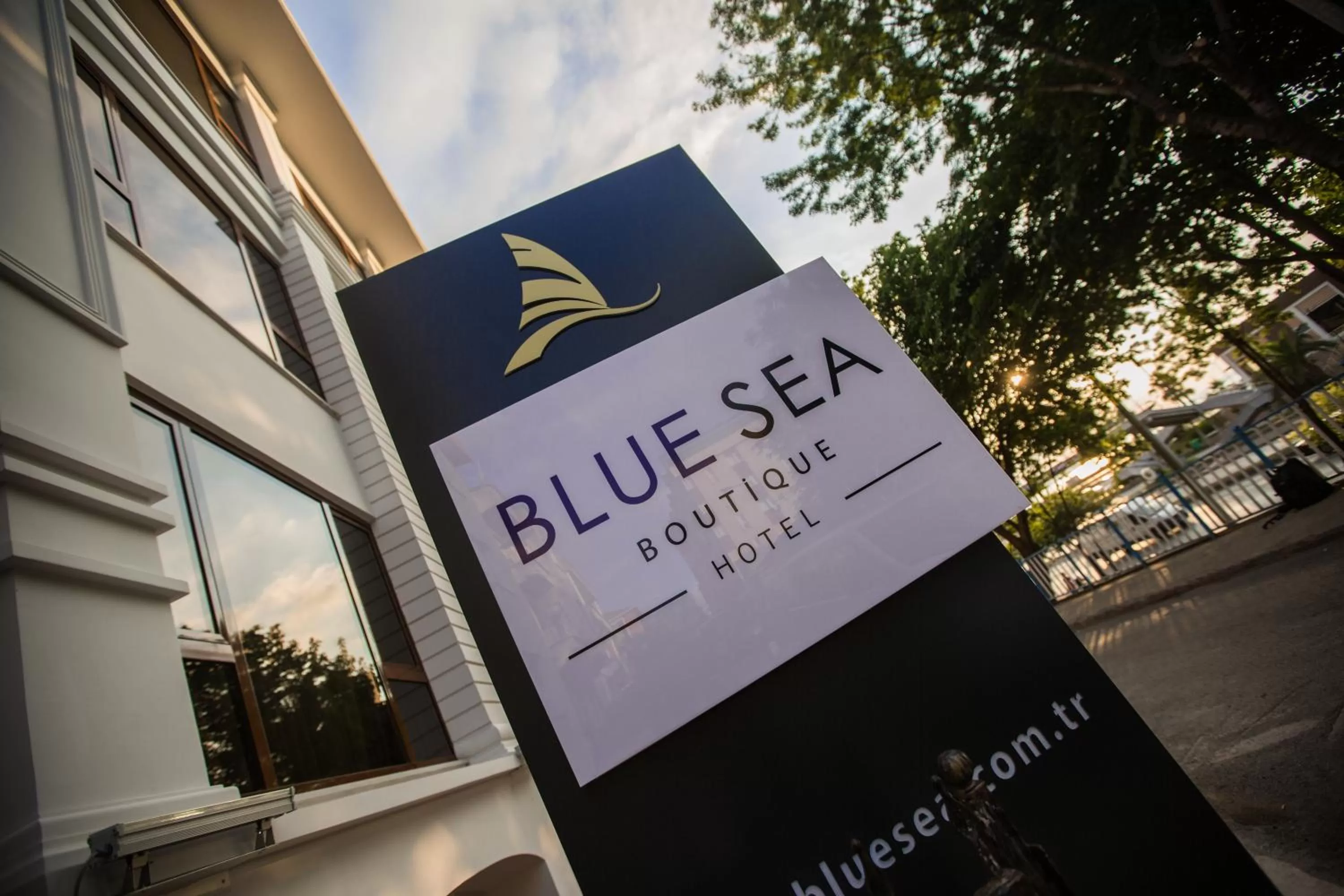 Property logo or sign in Blue Sea Hotel