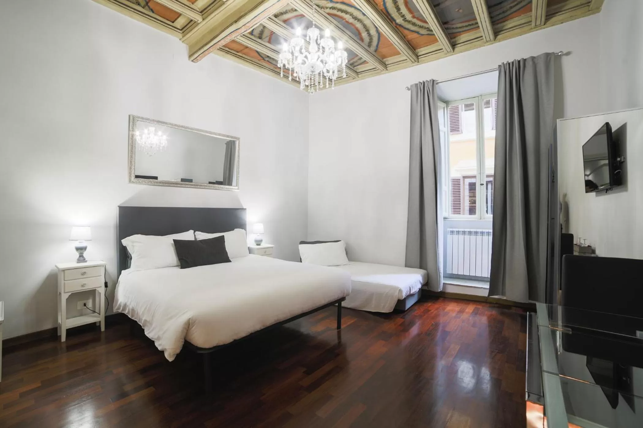 Photo of the whole room, Bed in La Maison Dell'Orologio