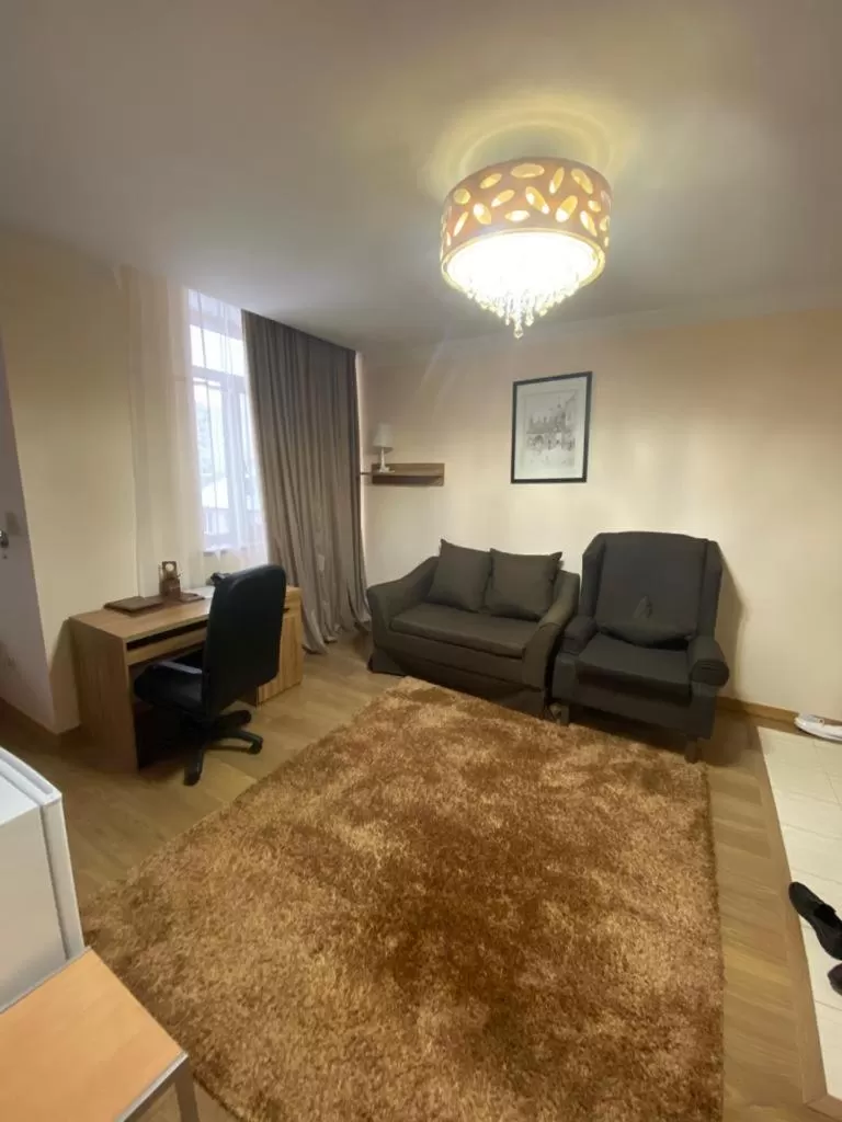 Photo of the whole room, Seating Area in ATB Grand Hotel