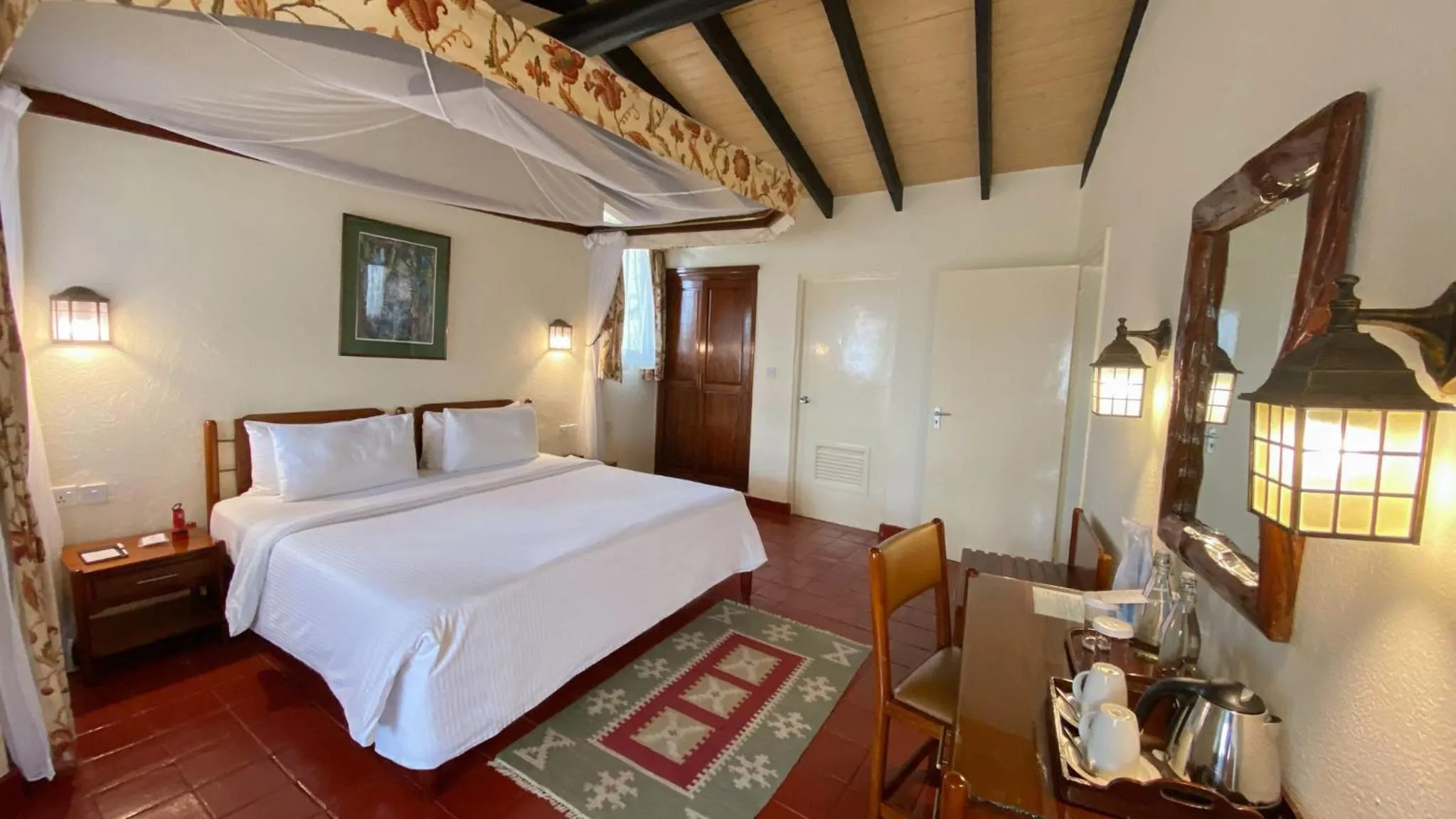 Bed in Sarova Lion Hill Game Lodge